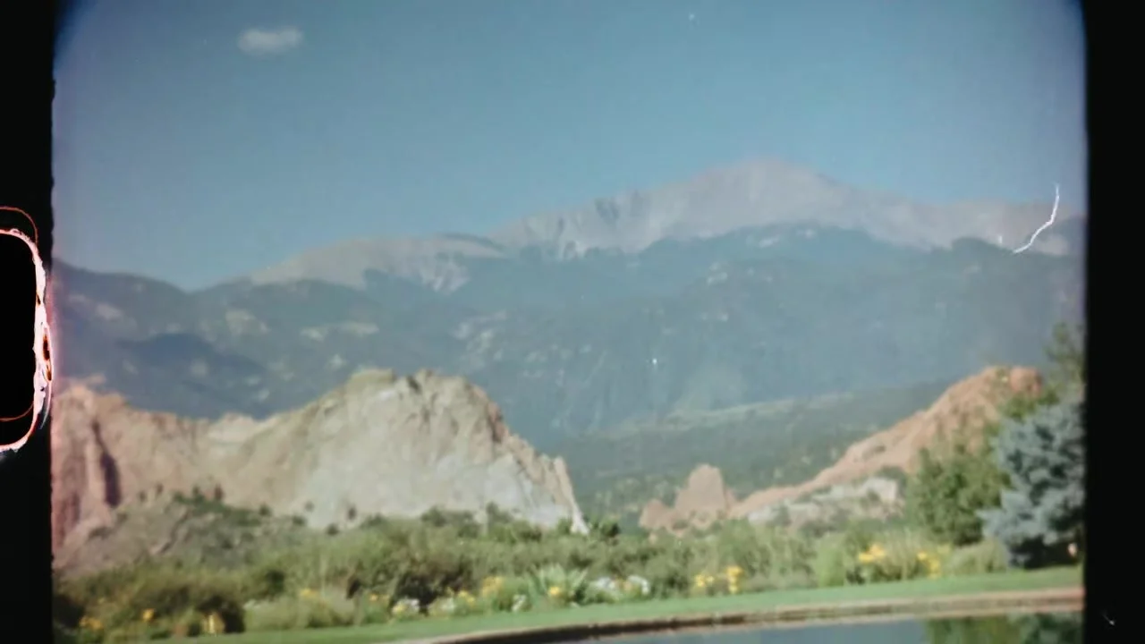 Super 8 establishing shot of Garden of the Gods and Pikes Peak