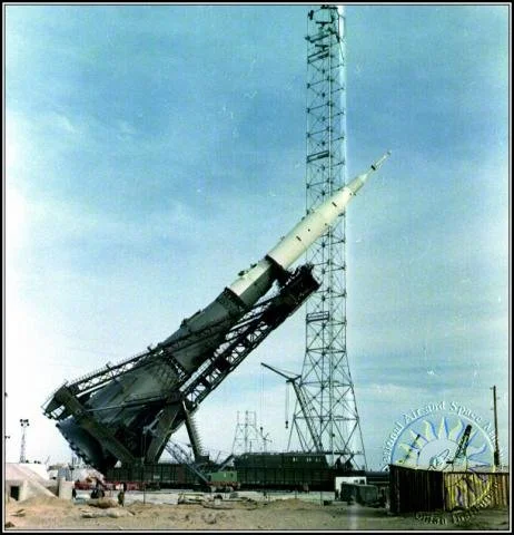 A large N1 rocket mounted on a launch pad, aimed upward