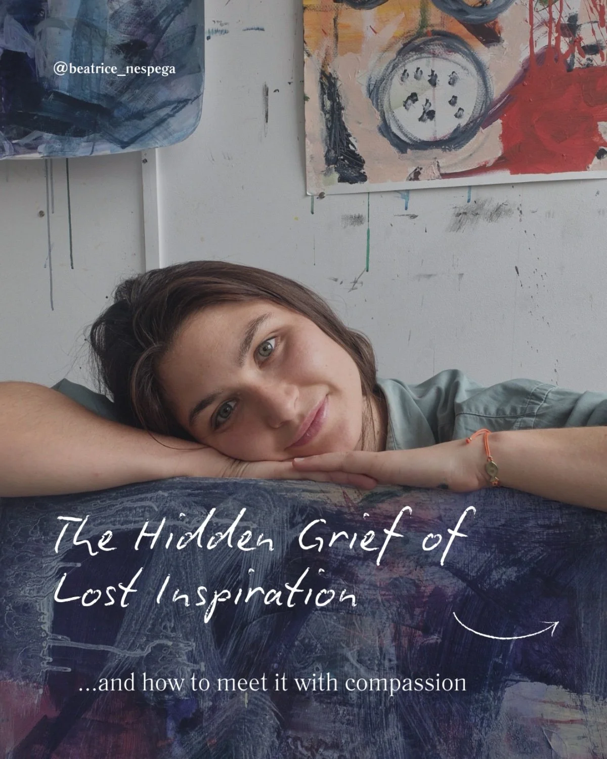 A young woman with brown hair and light-colored eyes rests her head on her arm, looking at the camera with a gentle smile. Behind her, there are abstract paintings on the wall. Text on the image reads "The Hidden Grief of Lost Inspiration...and how to meet it with compassion."