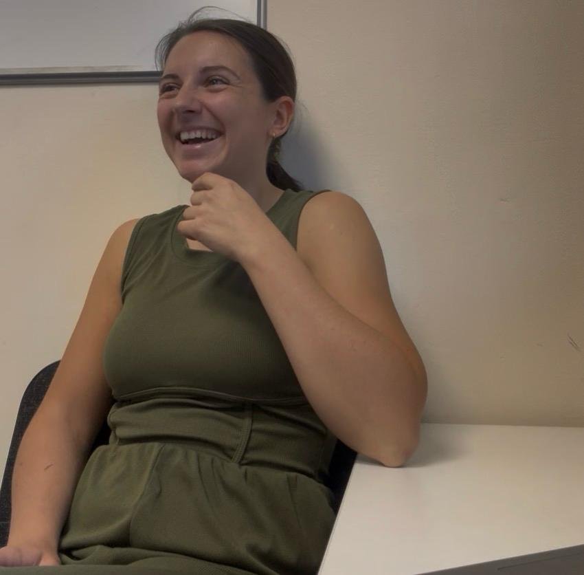 Heather smiling whilst delivering support