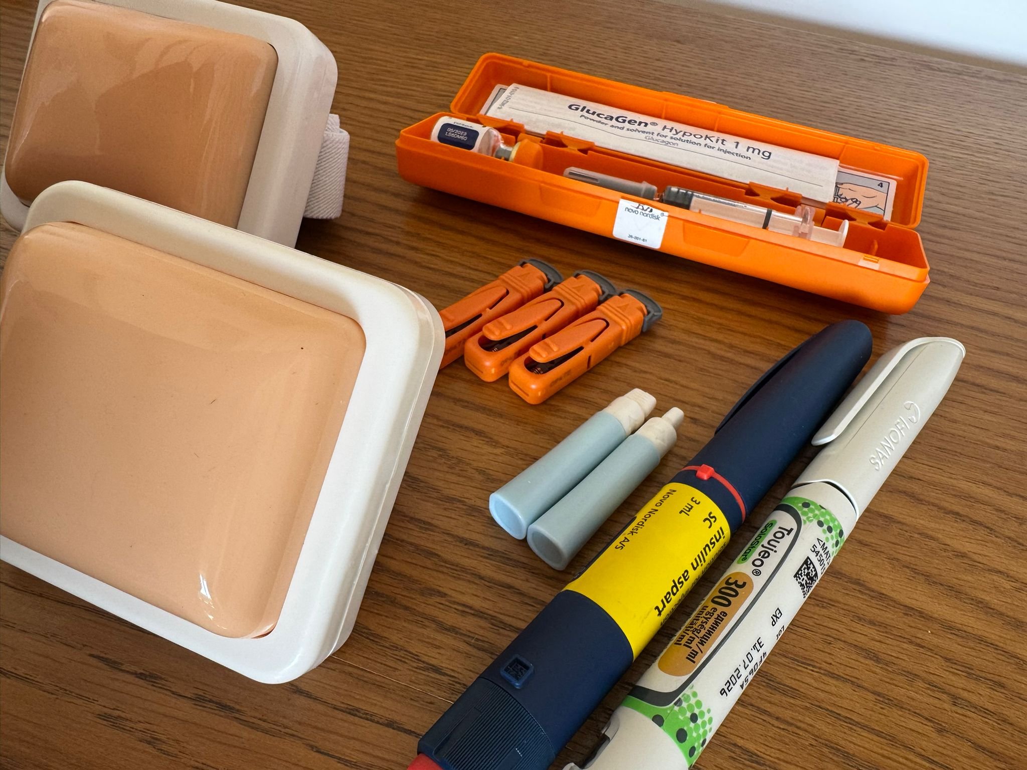 Assortment of diabetes training devices including insulin pen, glucagen and injection sites