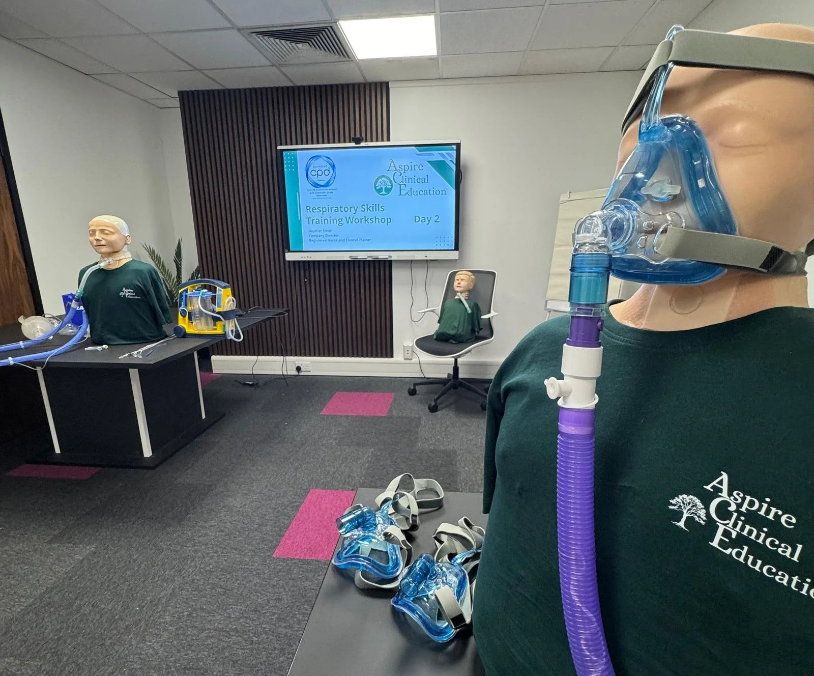 Set up of Respiratory Skills Training Workshop with 3 sim manikins and various respiratory support equipment