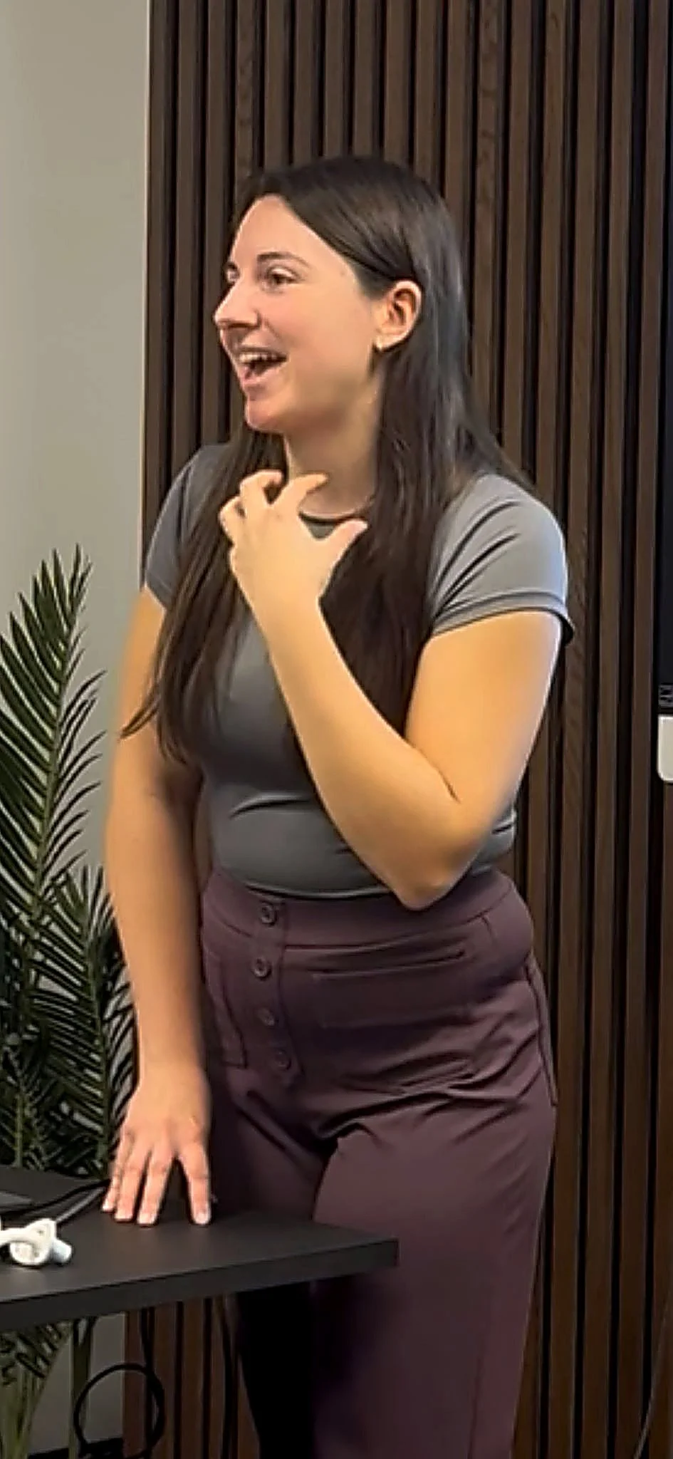 Heather speaking, smiling and using hands