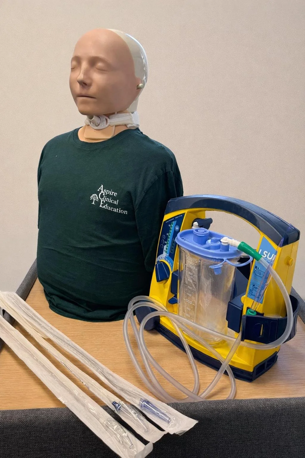 Laerdal Suction Unit machine and sim manikin