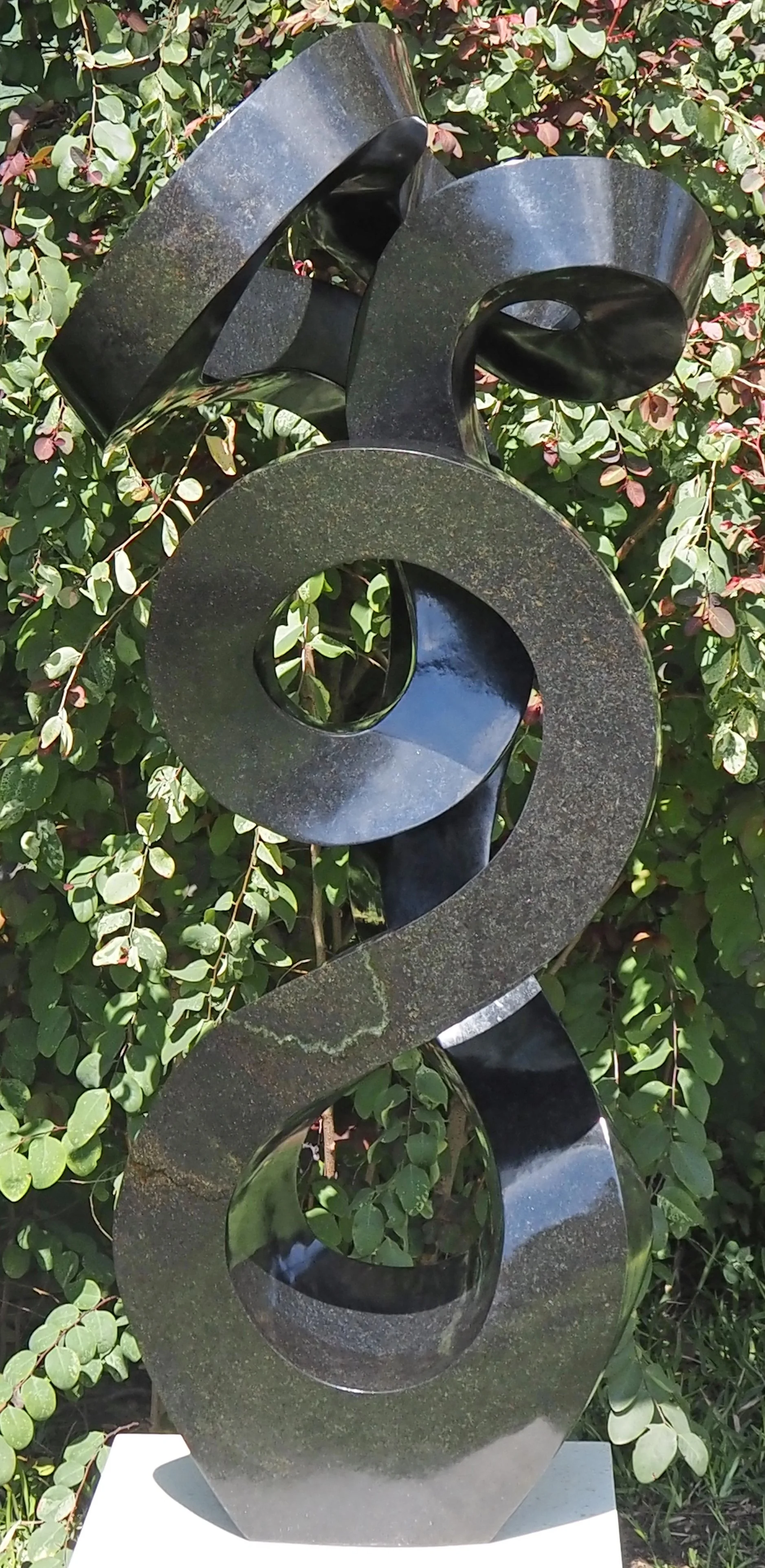 CHARLES KOWO (1980–present) 
 Caring Mother , 2025 
Springstone (Serpentine Stone) 
1.13 x 52 x 44 cm