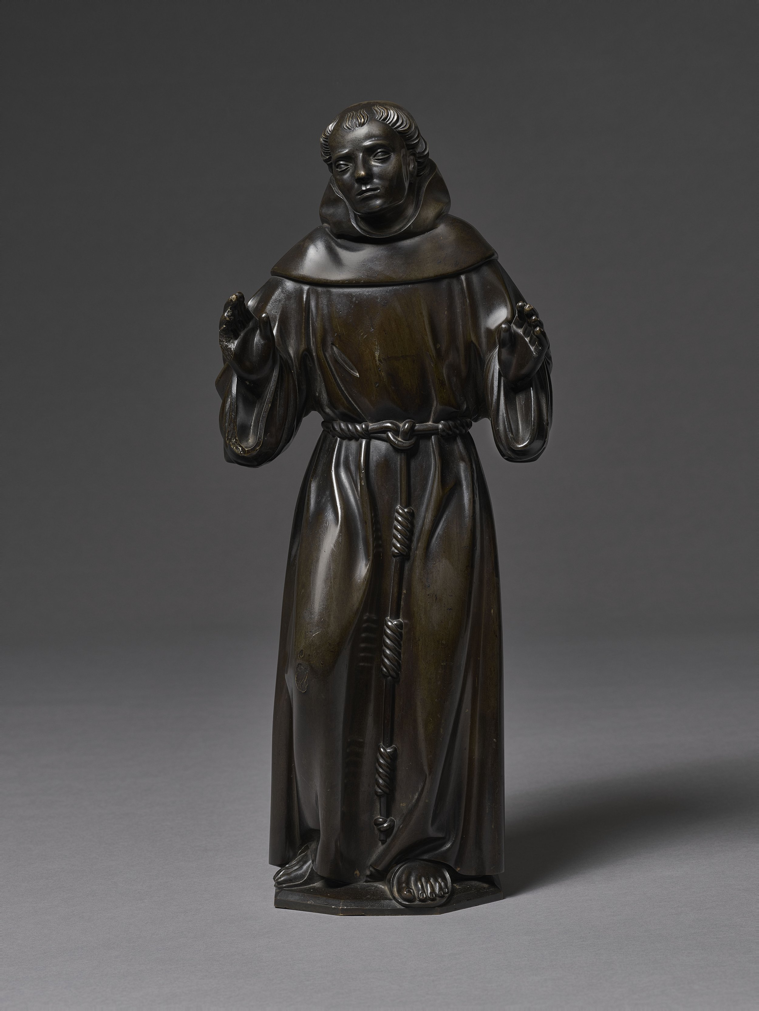 RENIER I VAN THIENEN (Brussels, active c. 1465–1498) 
 Saint Francis , c. 1480 
brass alloy 
48.3 x 20 x 13 cm