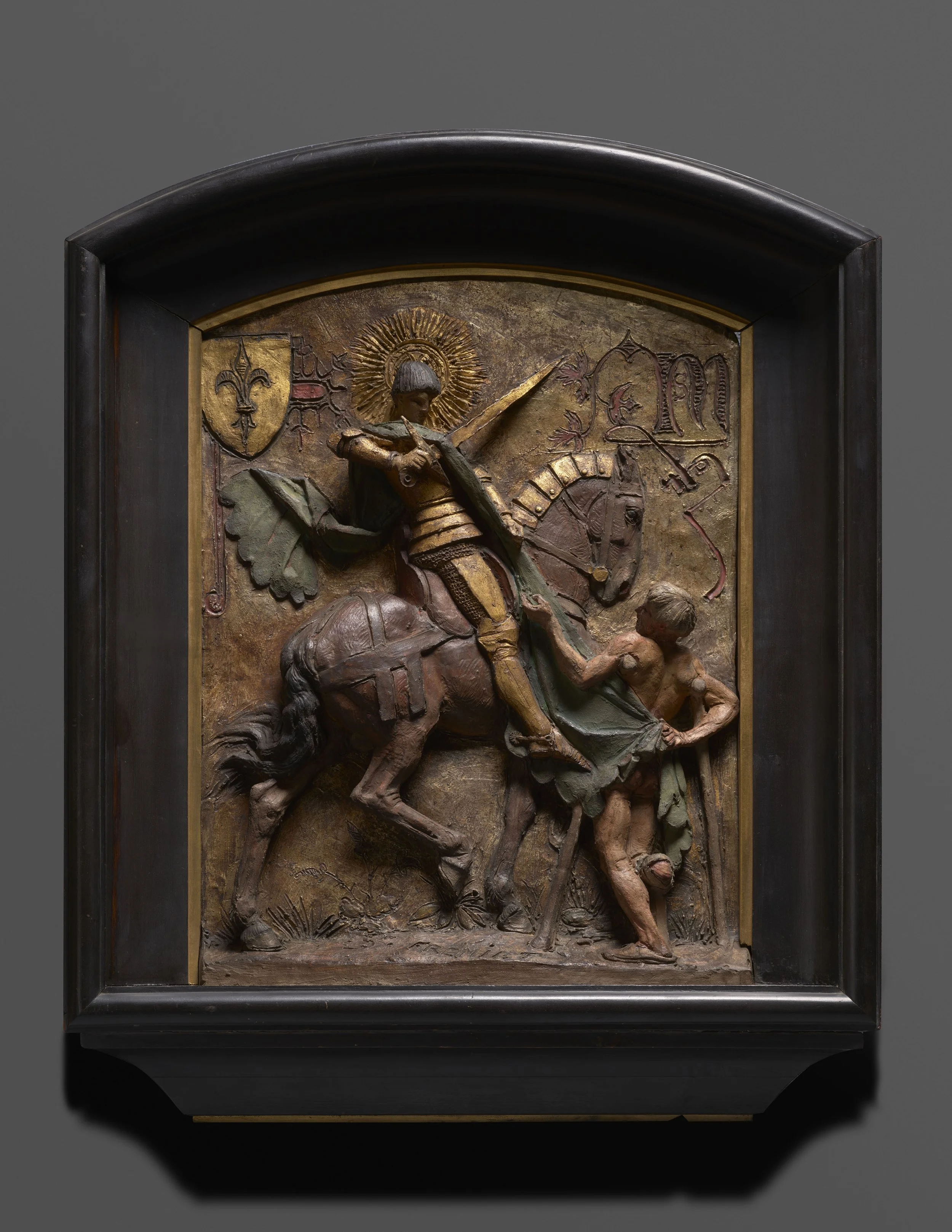 EMMANUEL FRÉMIET (1824–1910) 
 St. Martin Dividing his Cloak , c. 1880 
polychromed terracotta 
45 x 33 cm