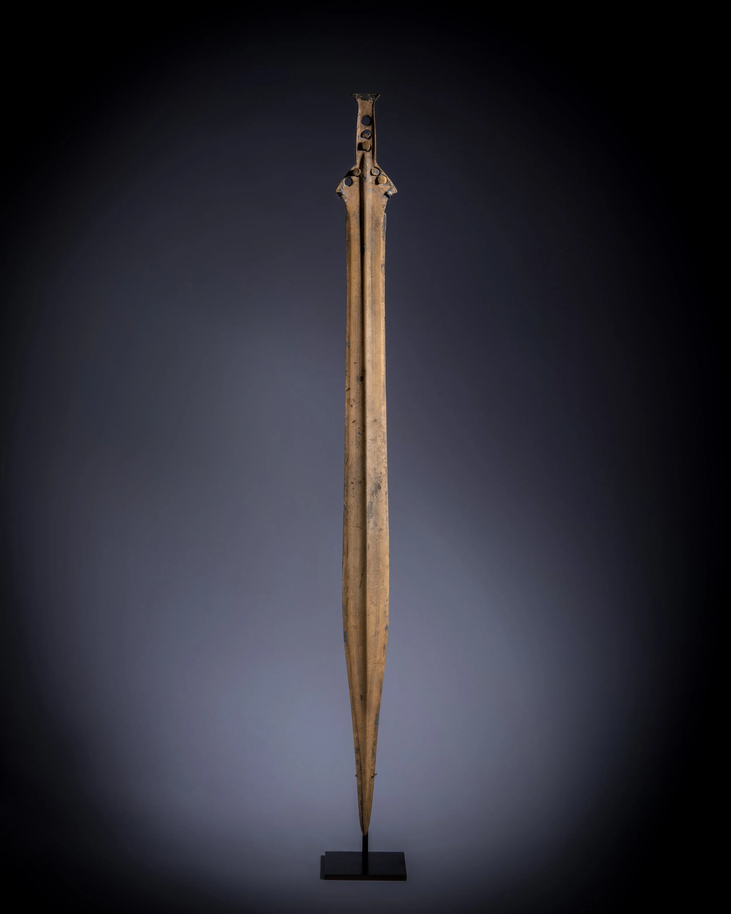  A fine bronze sword  , France, Bronze Age, c. 900–800 BC 
cast, hammered and incised bronze 
length: 71 cm
