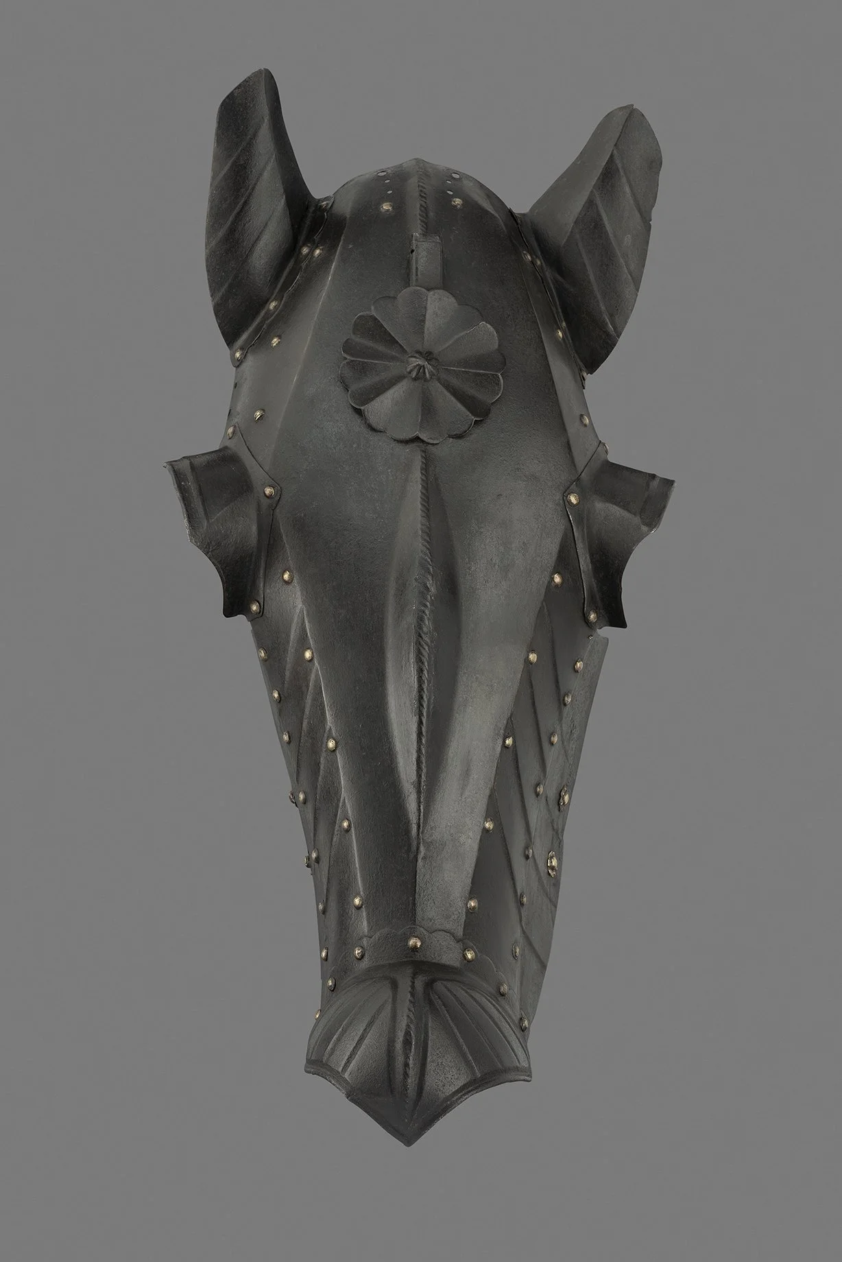  A Flemish Shaffron , c. 1520–1530 
steel, brass 
67 cm x 30 cm (26.4 in x 11.8 in.)