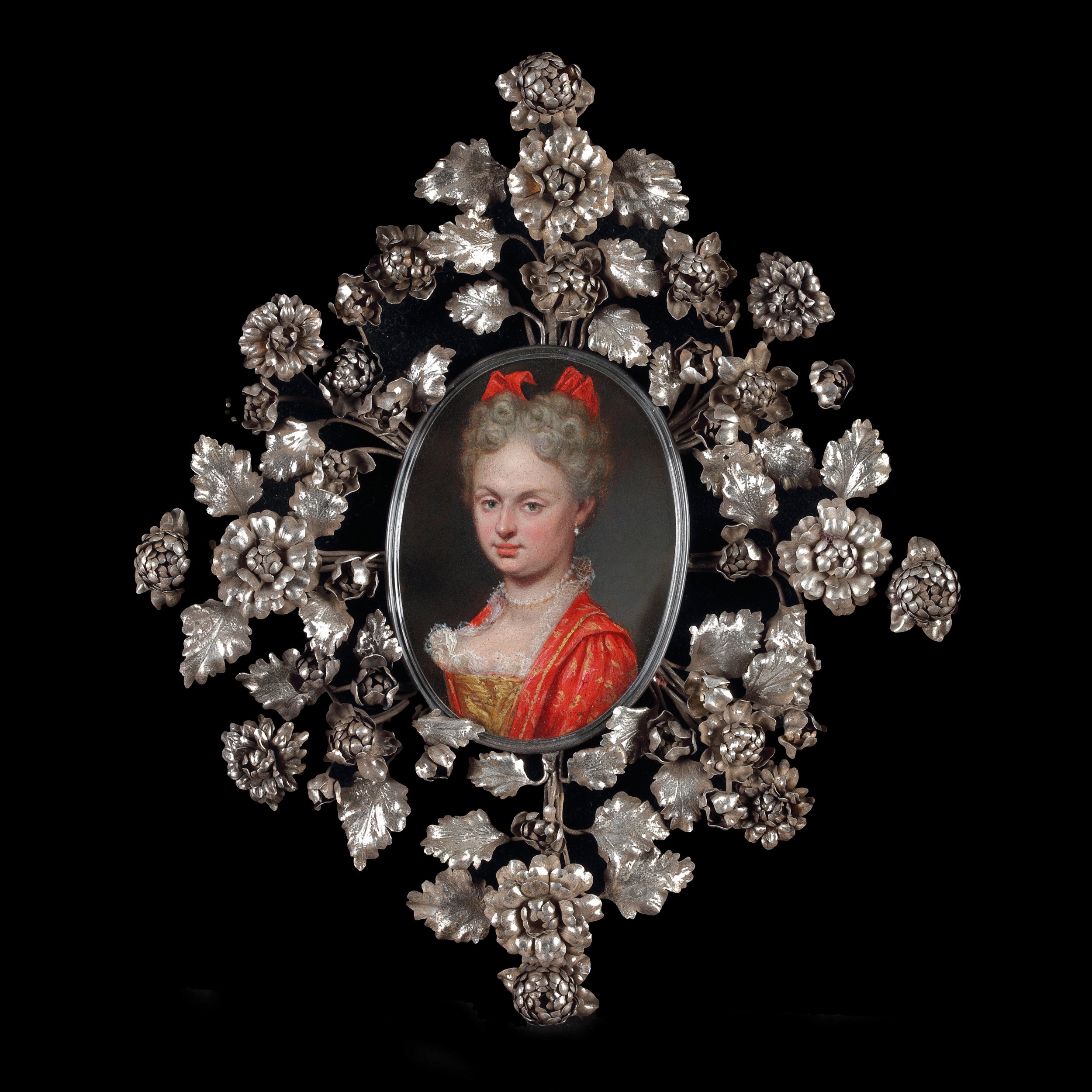 ROMAN SCHOOL (circa 1700) 
 Portrait of a Noblewoman, probably Maria Luisa Gabriella of Savoy (1688–1714), in a red dress with gold, lace-trimmed bodice, bust-length, with a pearl necklace and red headband’  
oil on copper 
oval, h: 75 mm (2⅞ in.)