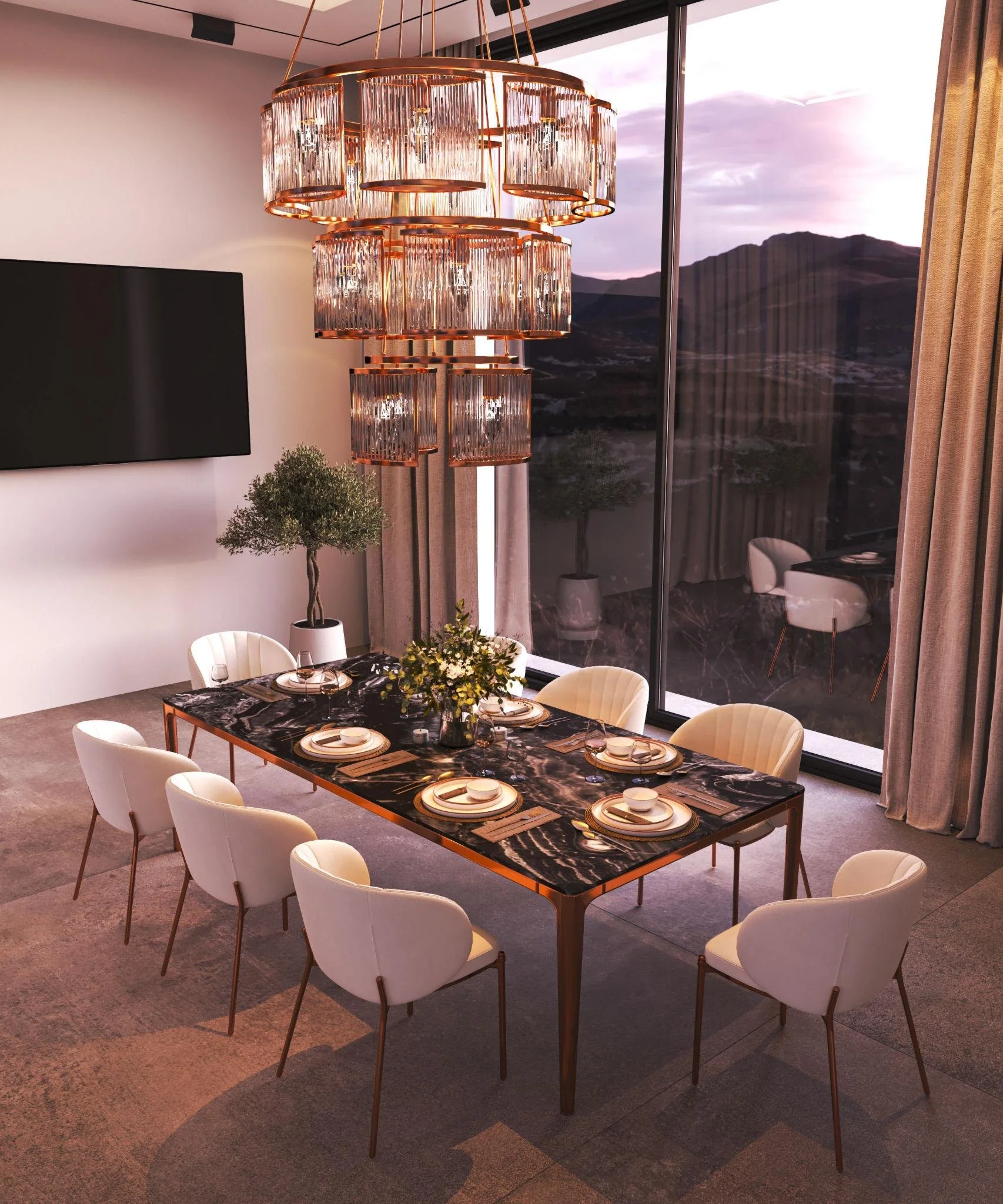 A modern dining room with a black marble table set for six, surrounded by white upholstered chairs. A large, elegant chandelier hangs above, and there is a view of mountains through glass sliding doors with beige curtains. There is also a potted topi