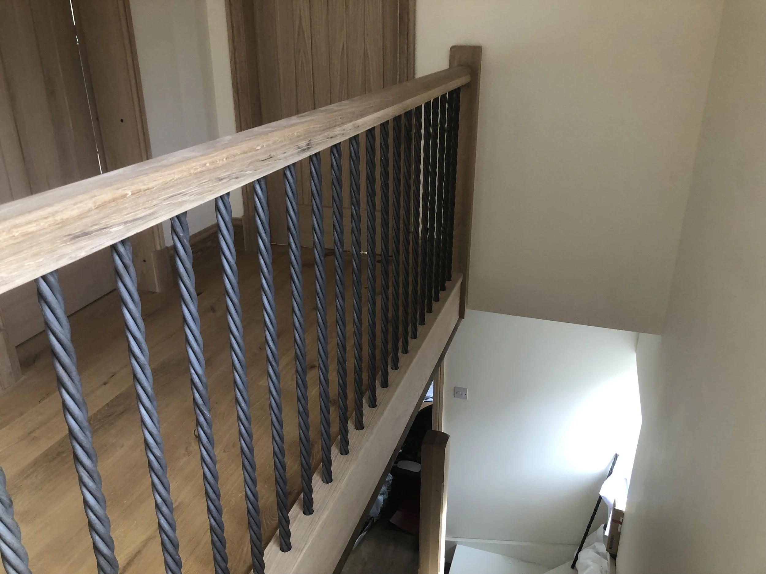 Staircase - Wood Handrail, Posts & Steel Balustrade