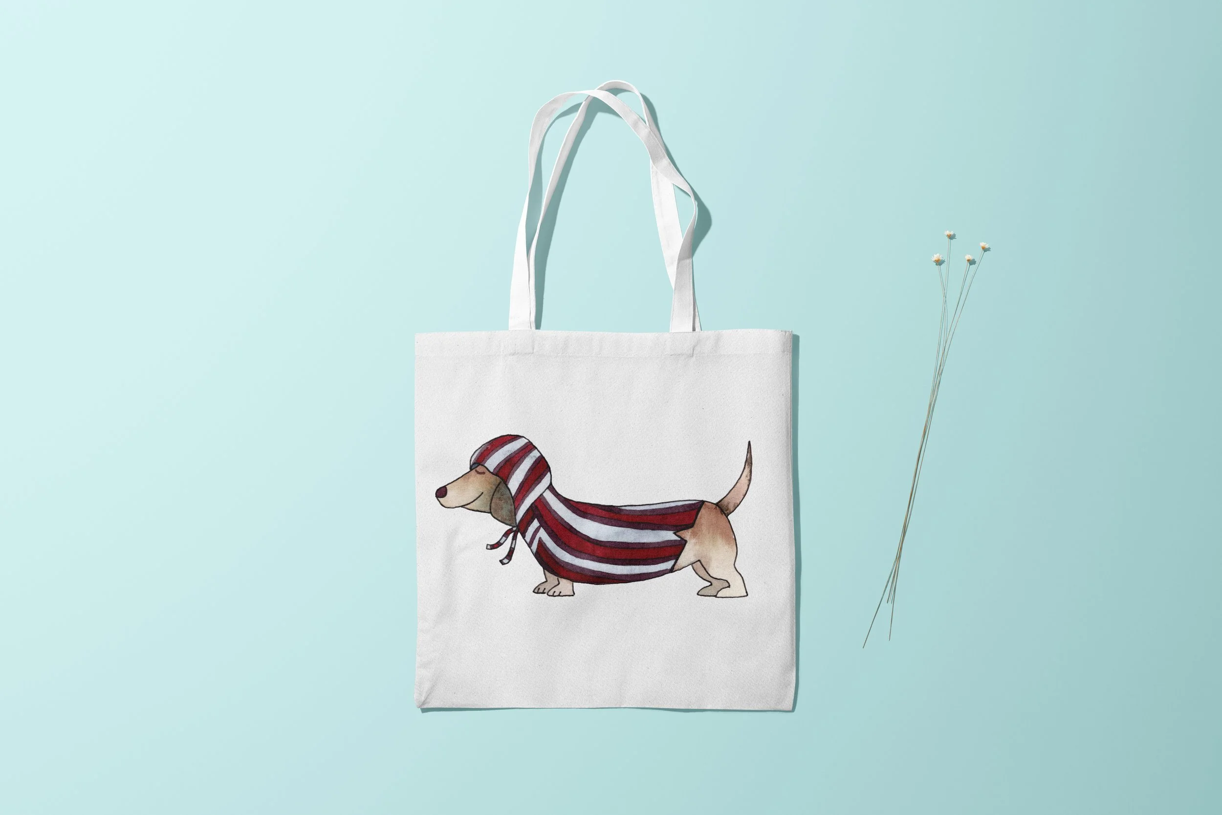 Tote bag of a dachshund wearing a hoodie