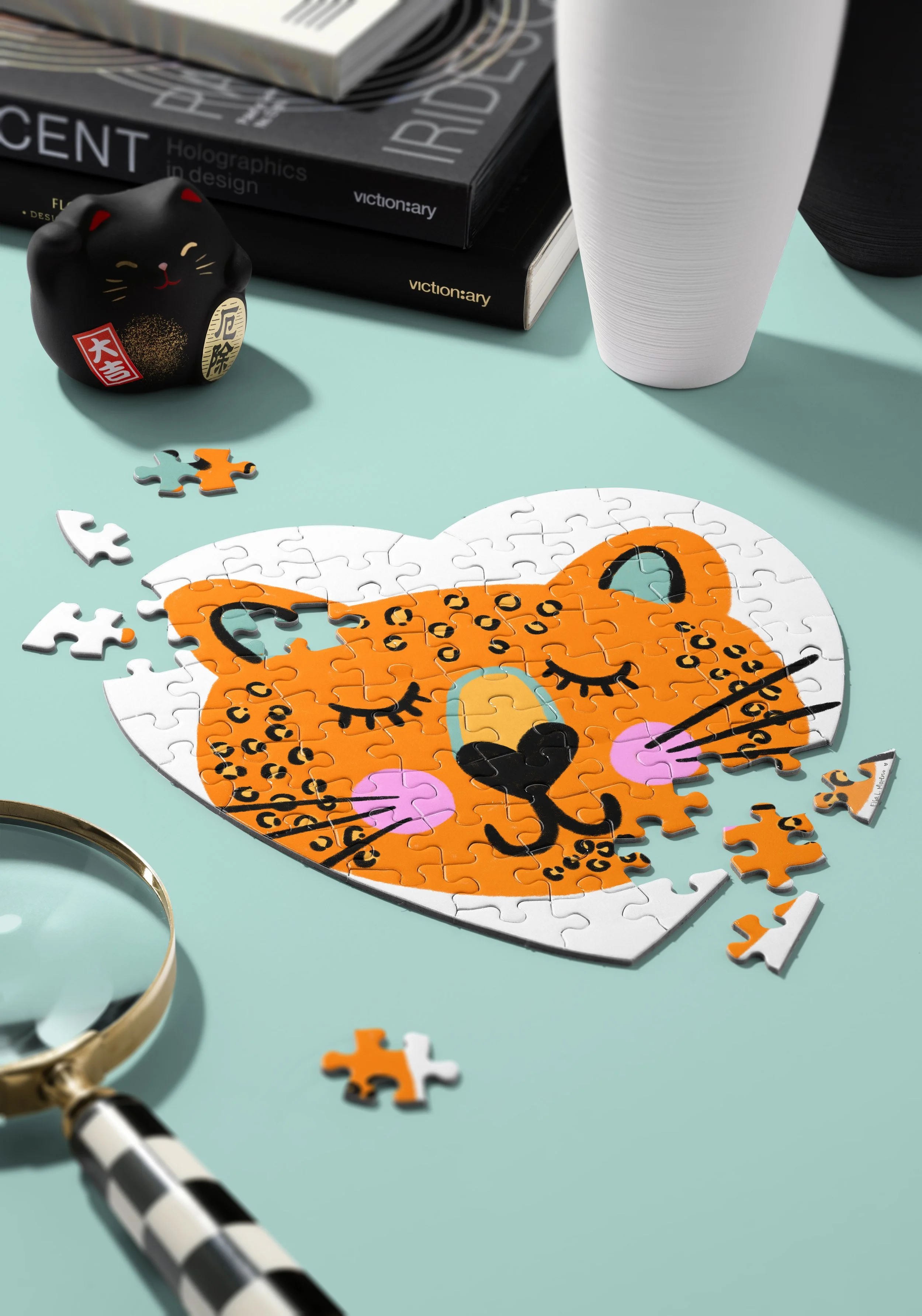 Image shows a heart shaped puzzle of a colorful leopard.