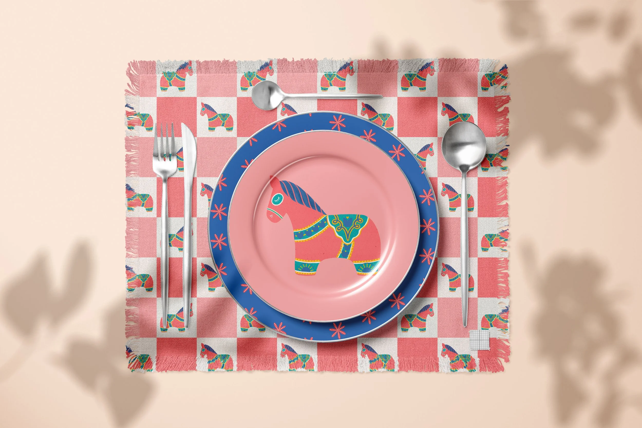 Placemat and plates set featuring three different illustrations of a Dala Horse print and pattern collection
