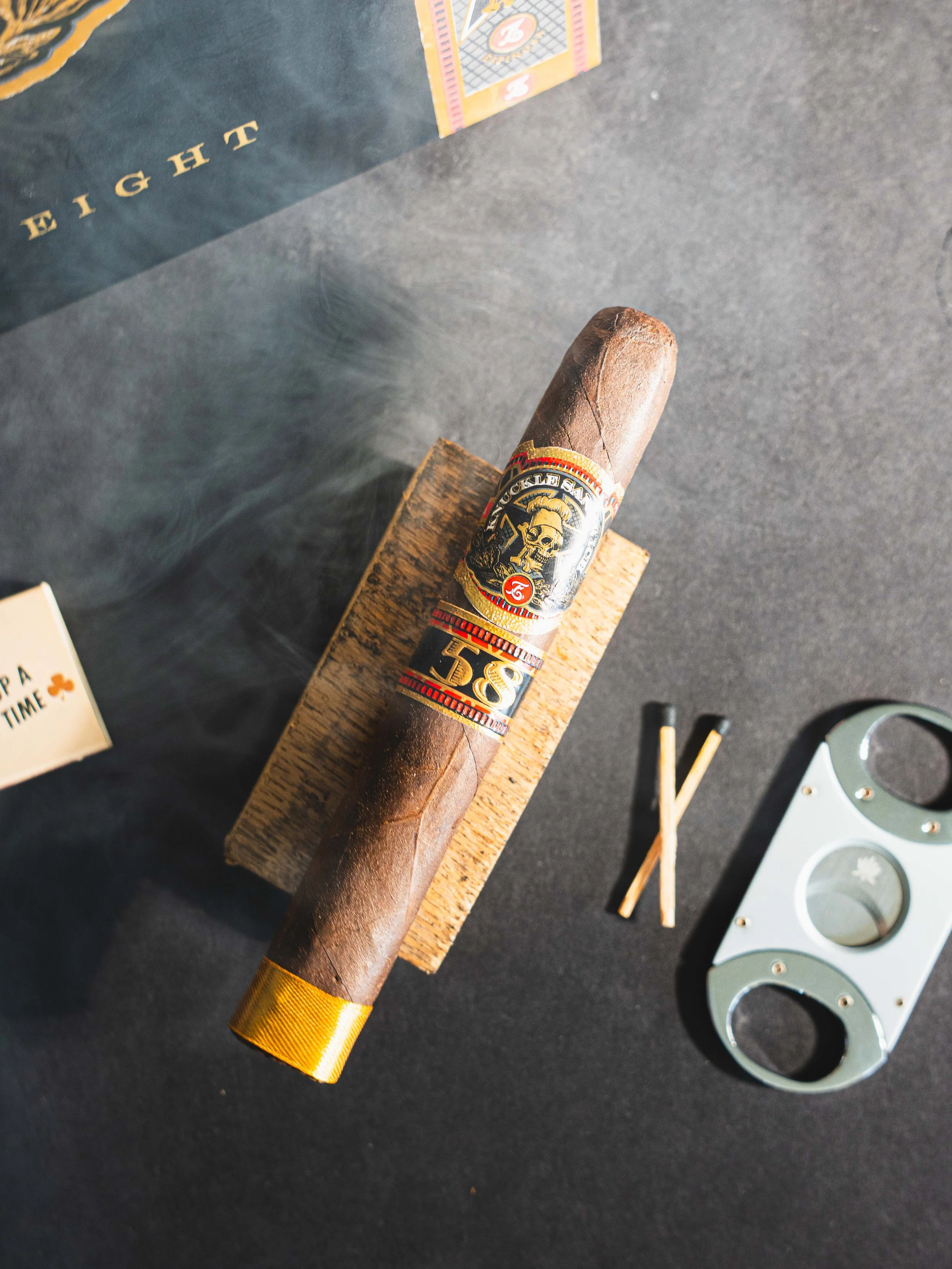 Espinosa Knuckle Sandwich 58 cigar and accessories