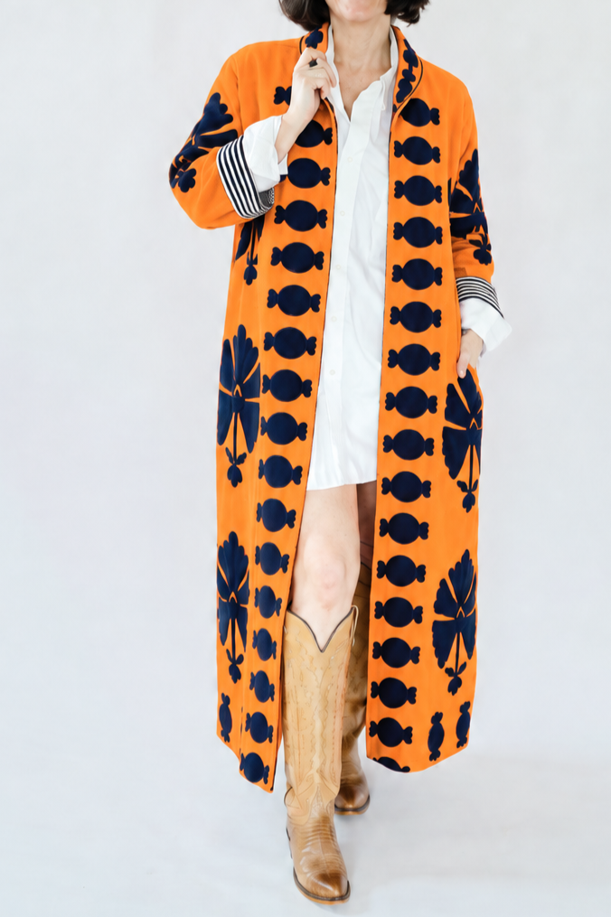 Joyful+Orange+Coat+Fashion+Portrait.png