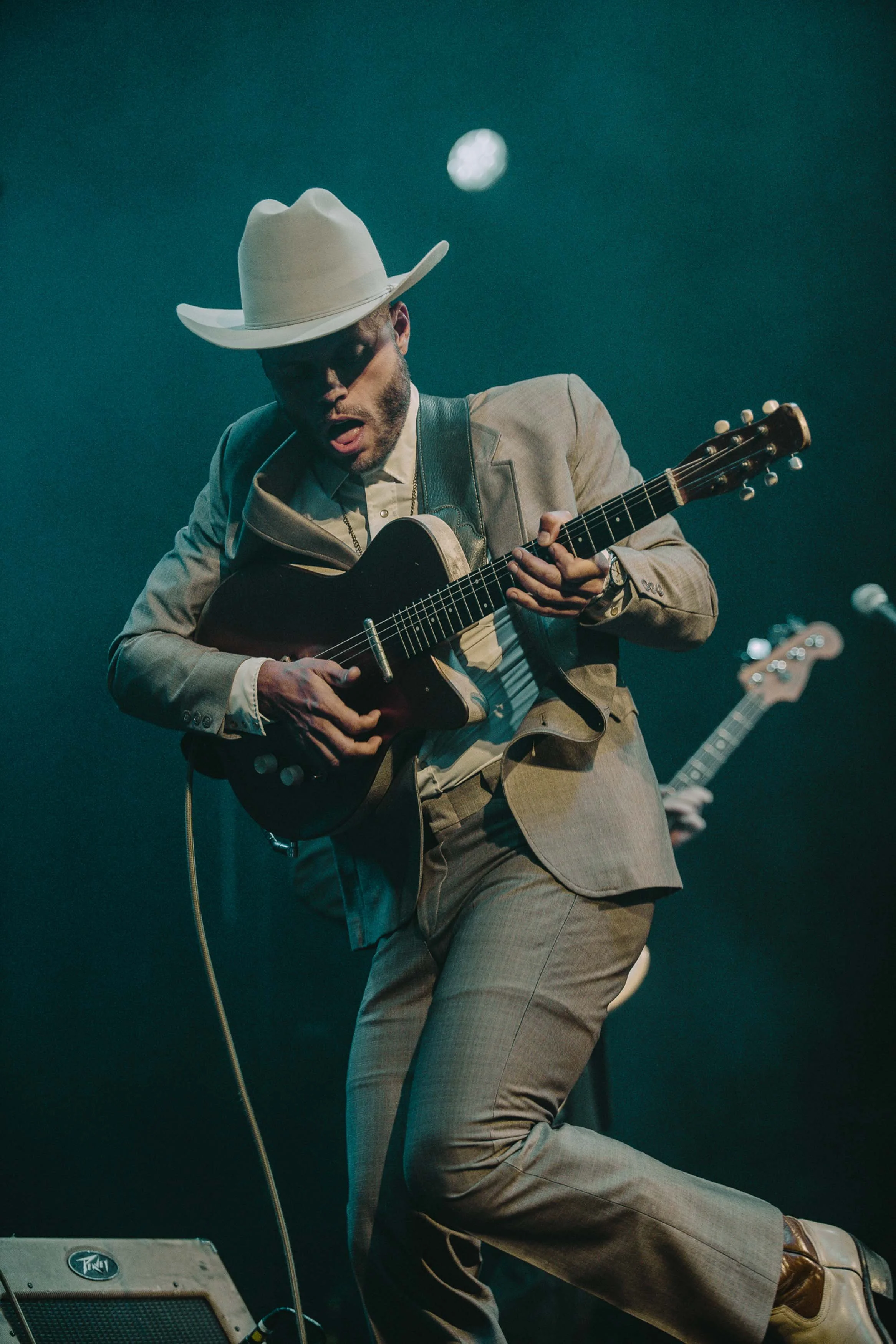 Charley Crockett with guitar at Tower theatre