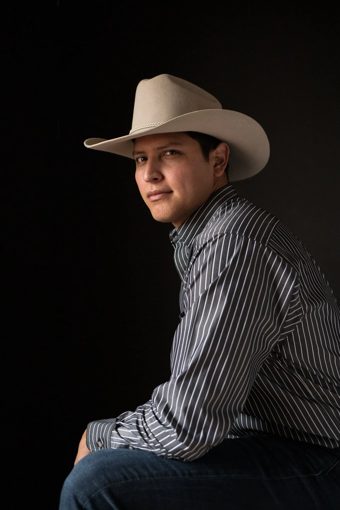 Musician with cowboy hat and Western Shirt
