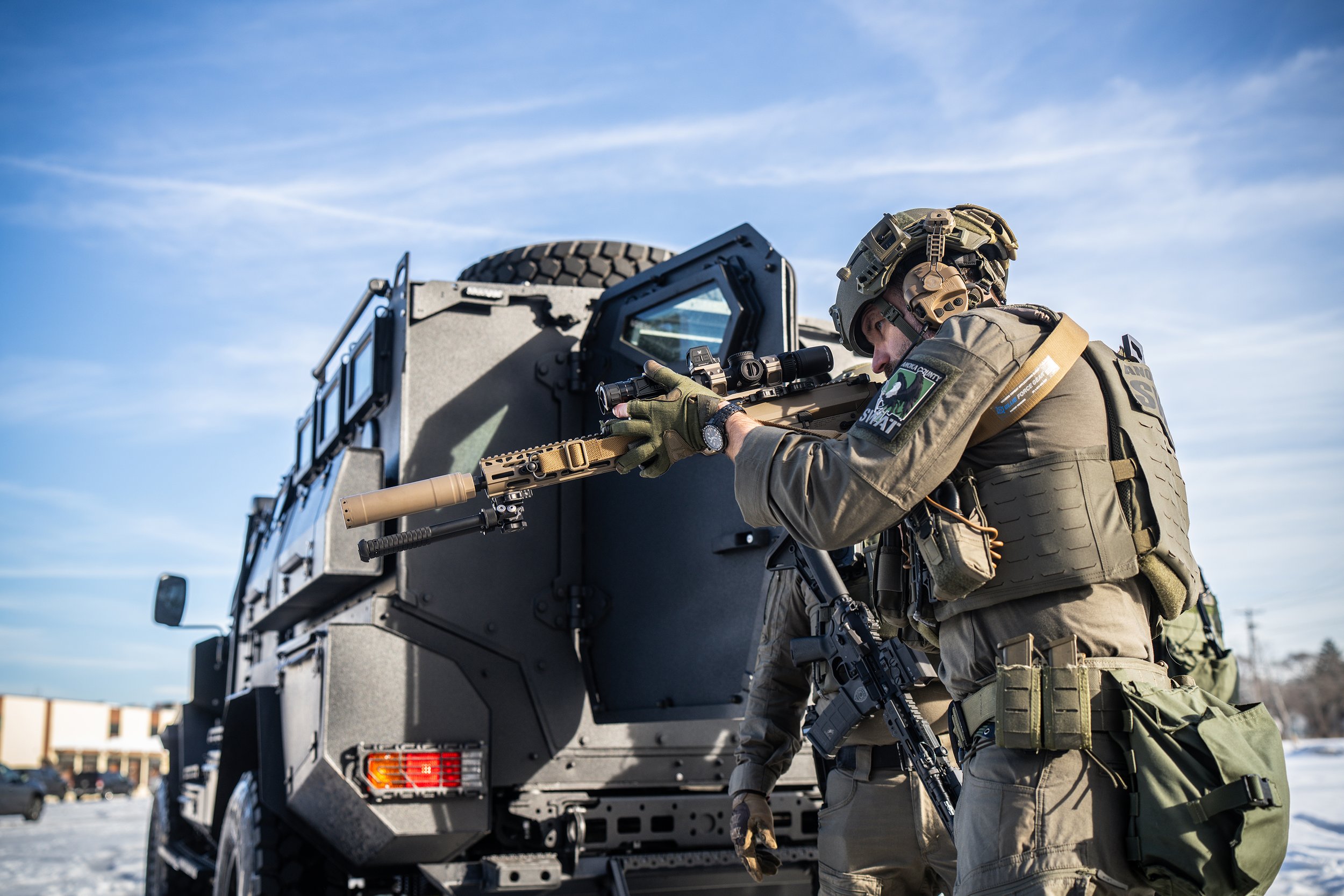 SWAT team deploying from Renegade APC
