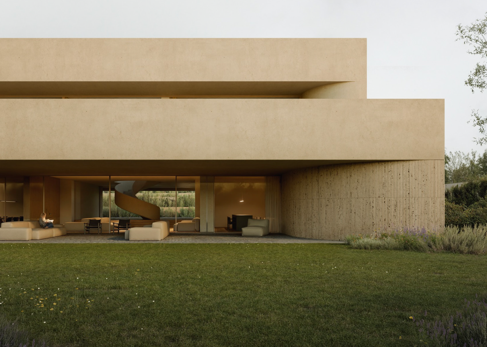Modern huis met grote glazen ramen, beige balkon en tuin met groen gras en kleine bloemen.