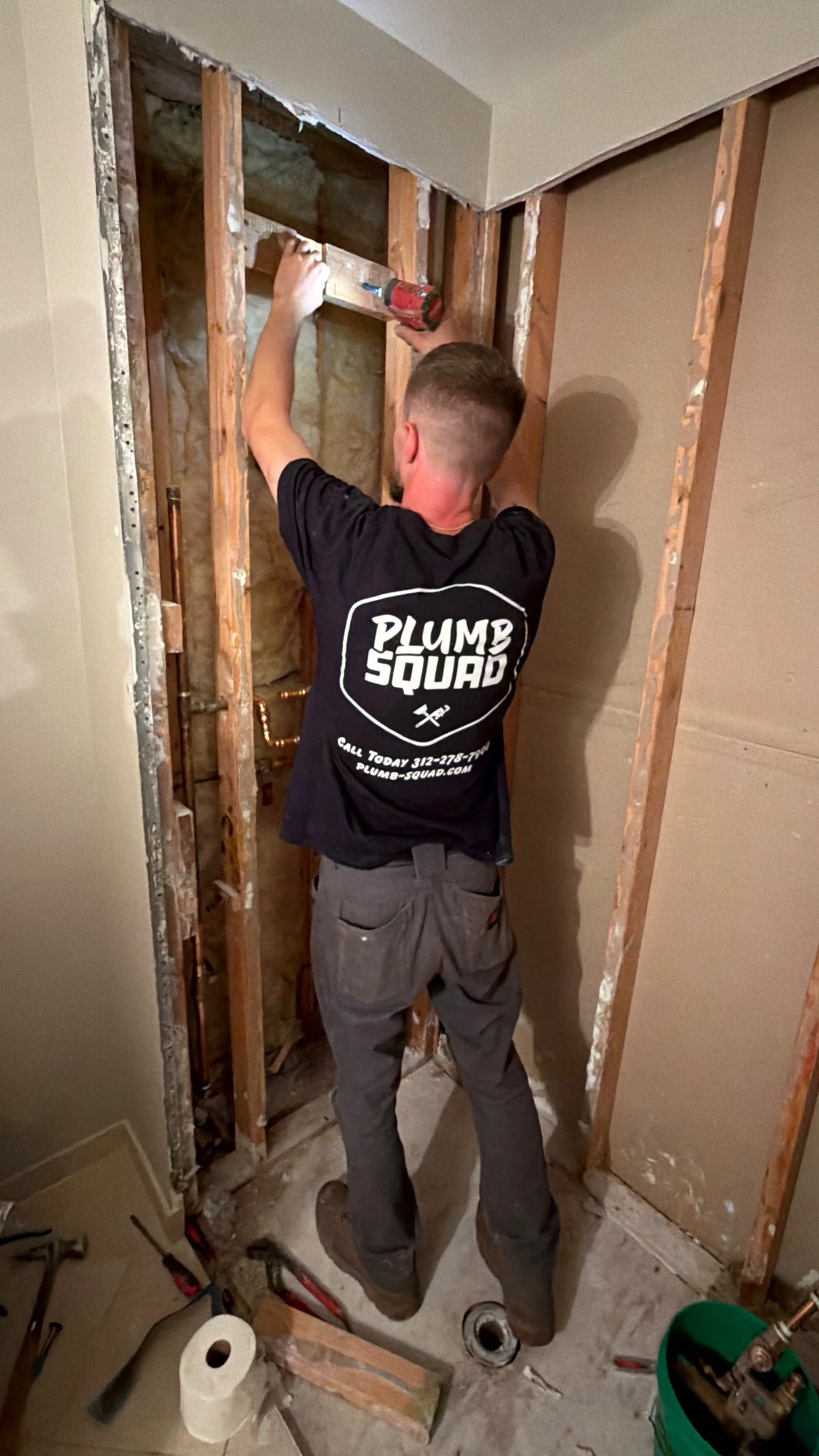 plumb squad team working.jpeg