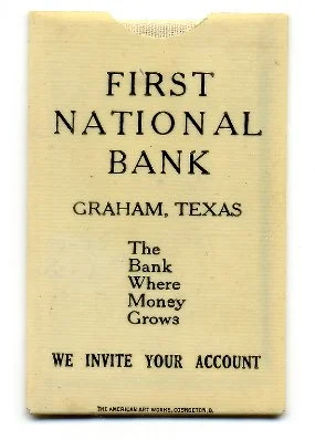 Old Plaque reading: First national bank. Graham, texas. The bank where money grows. We Invite your account