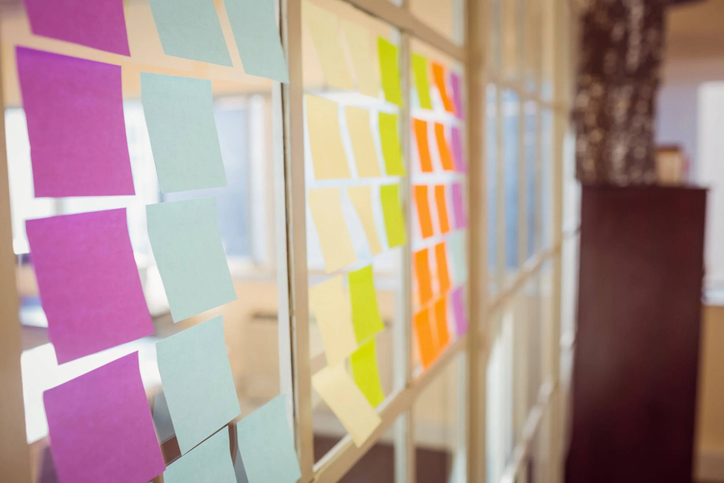 Product team using post-its to develop a digital product