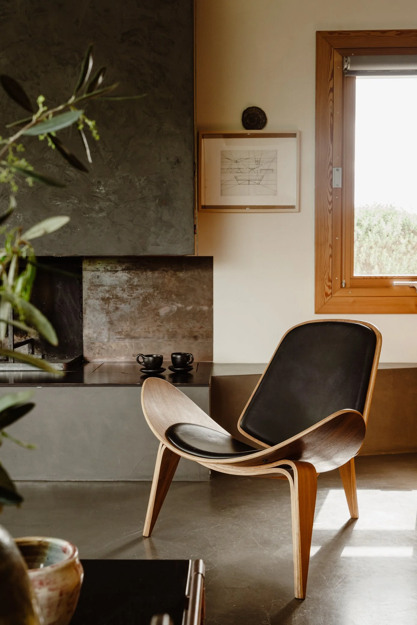 Hans J. Wegner Shell Chair in a beautiful modern Italian setting