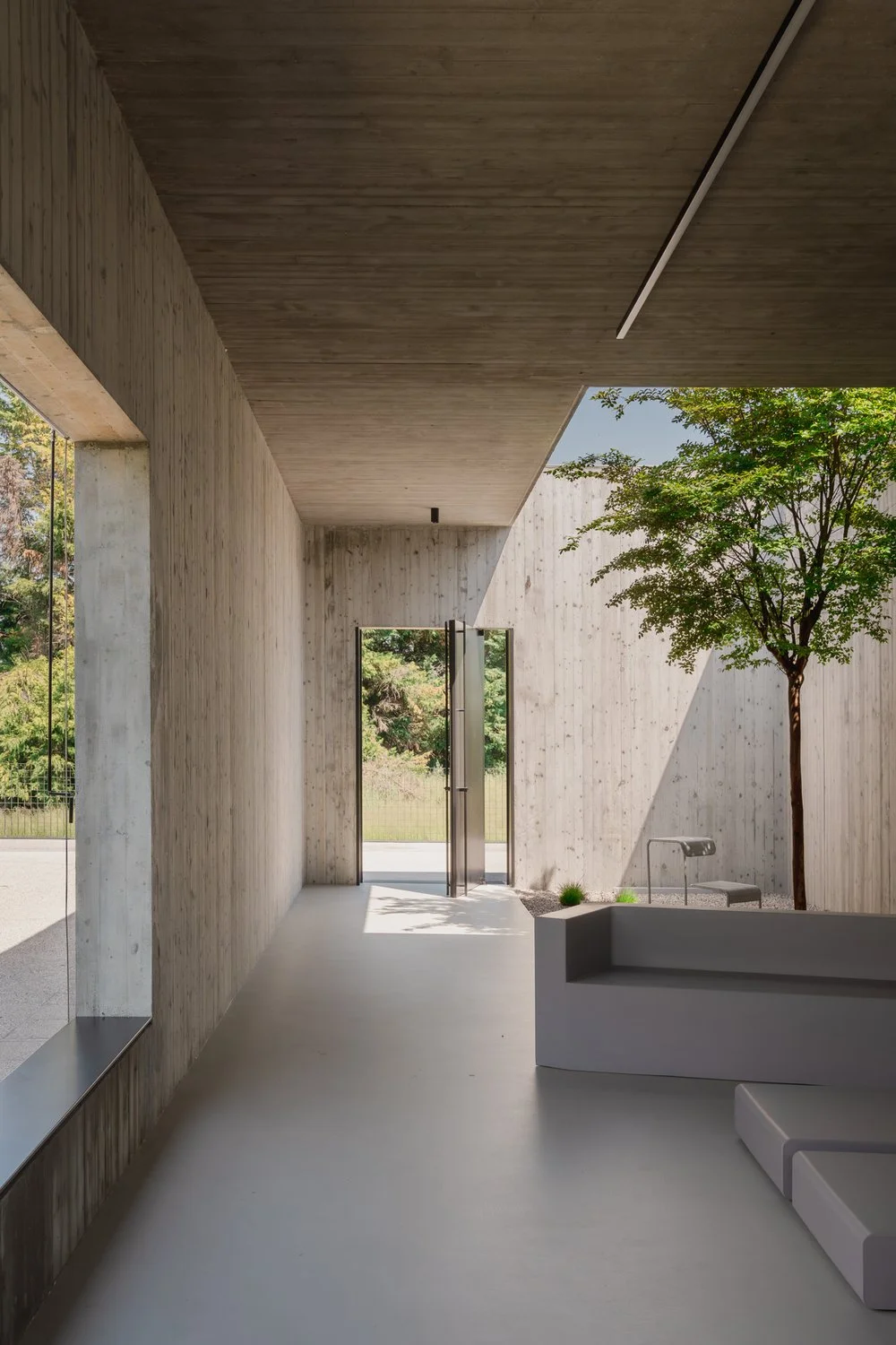 Brutalist architecture in Italy with green trees