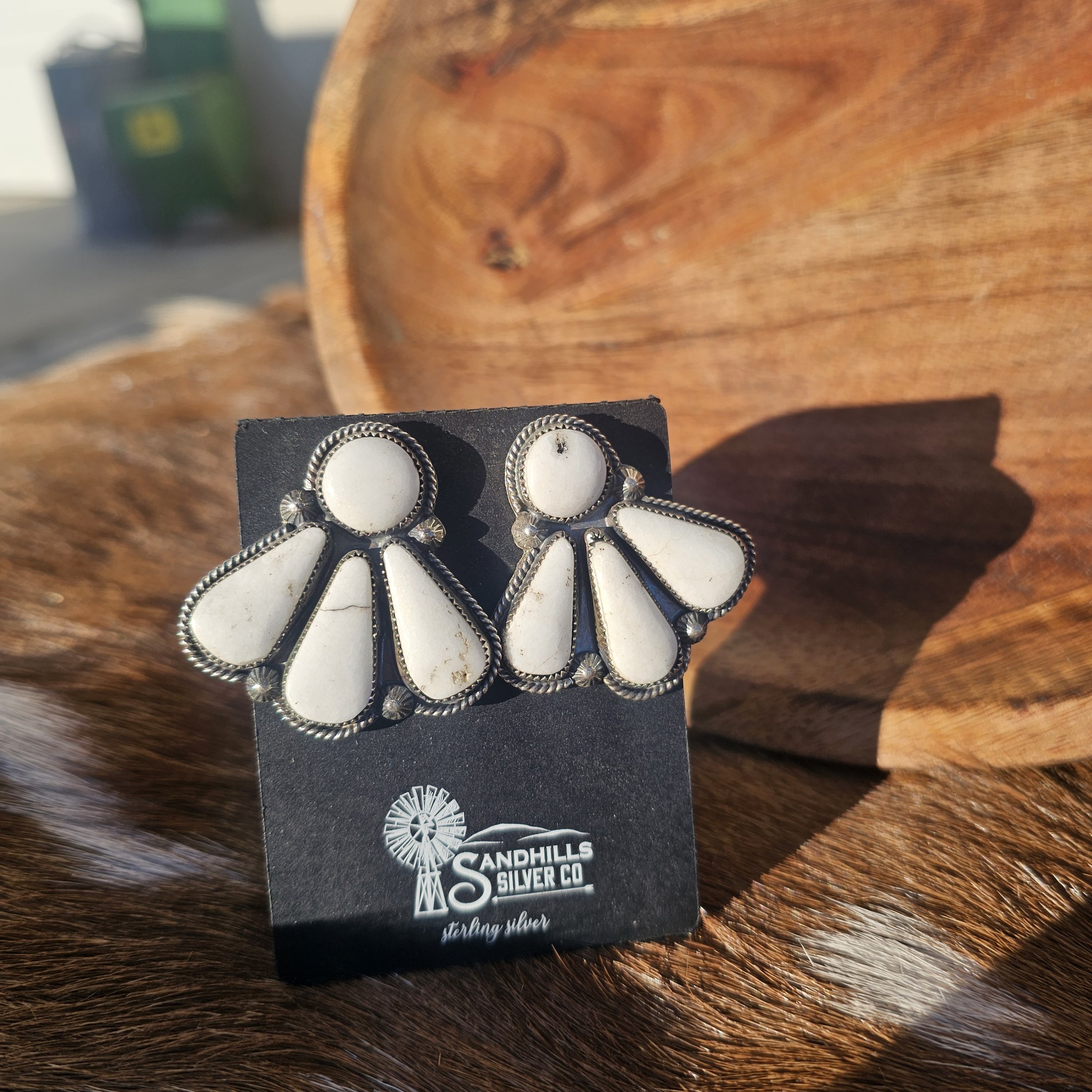 White buffalo fan earrings