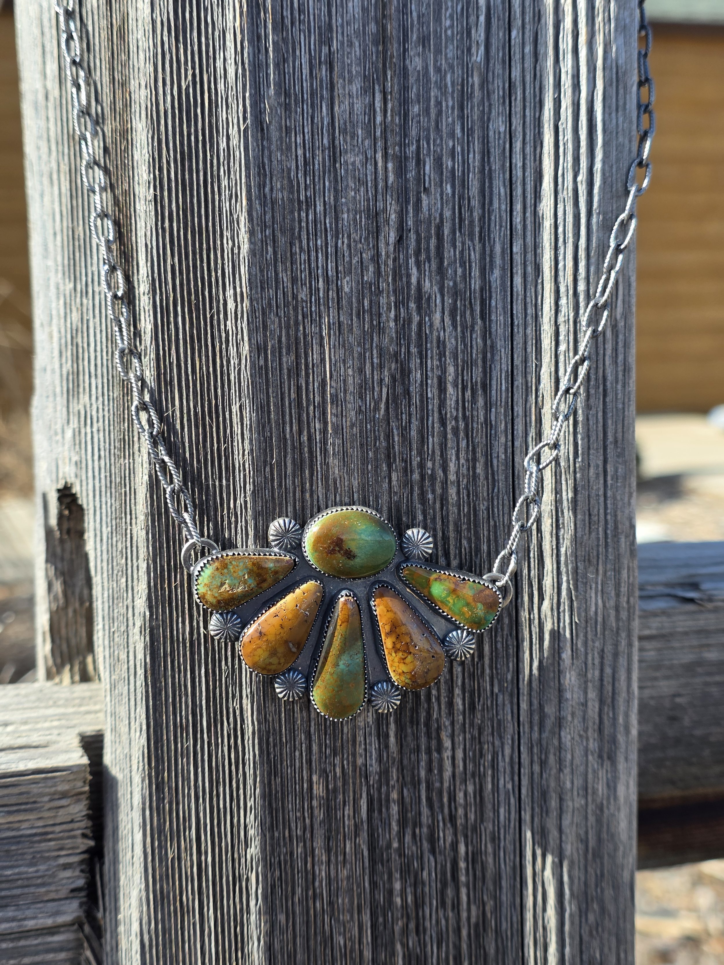 Brown and turquoise fan necklace.