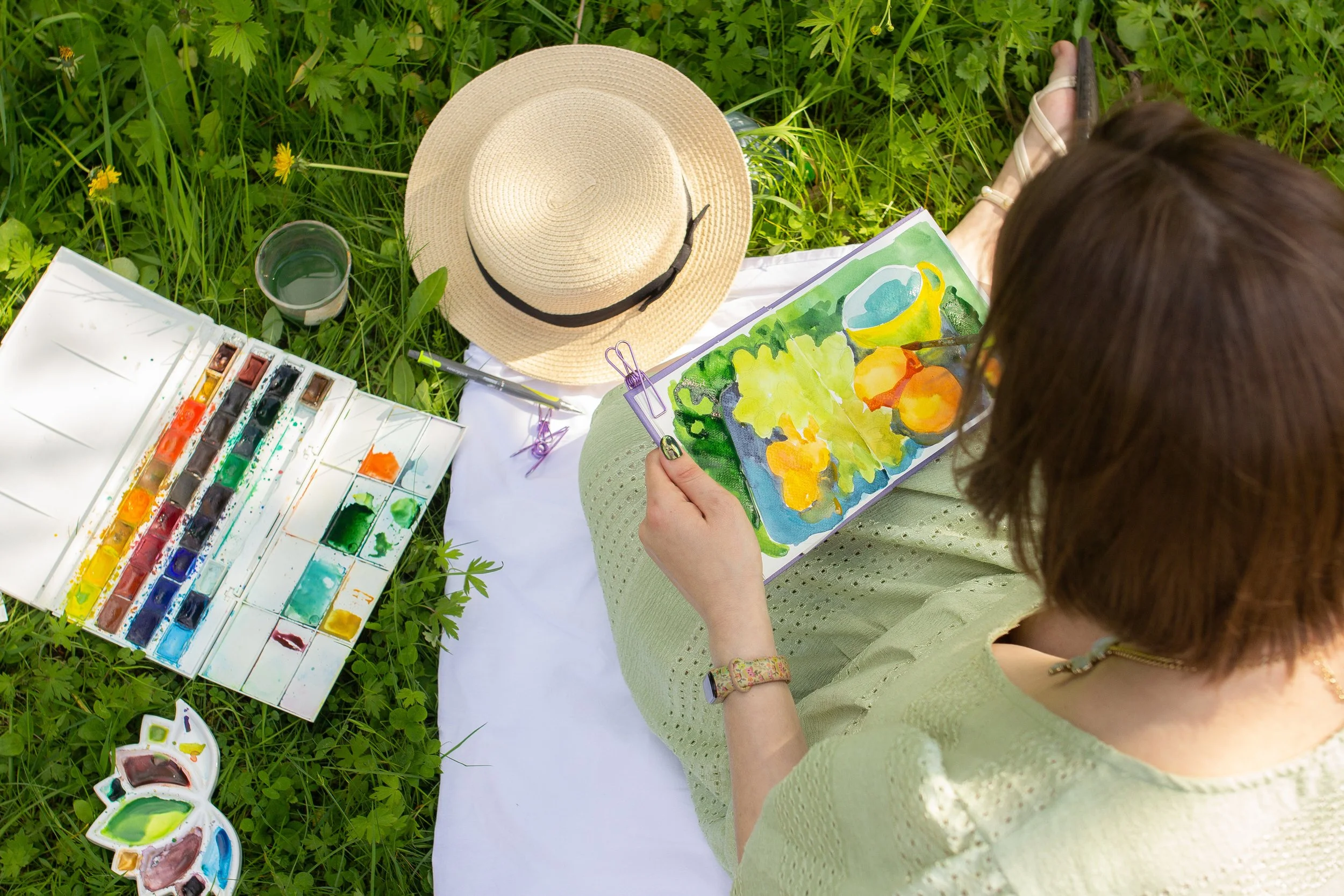 painting outside in the grass