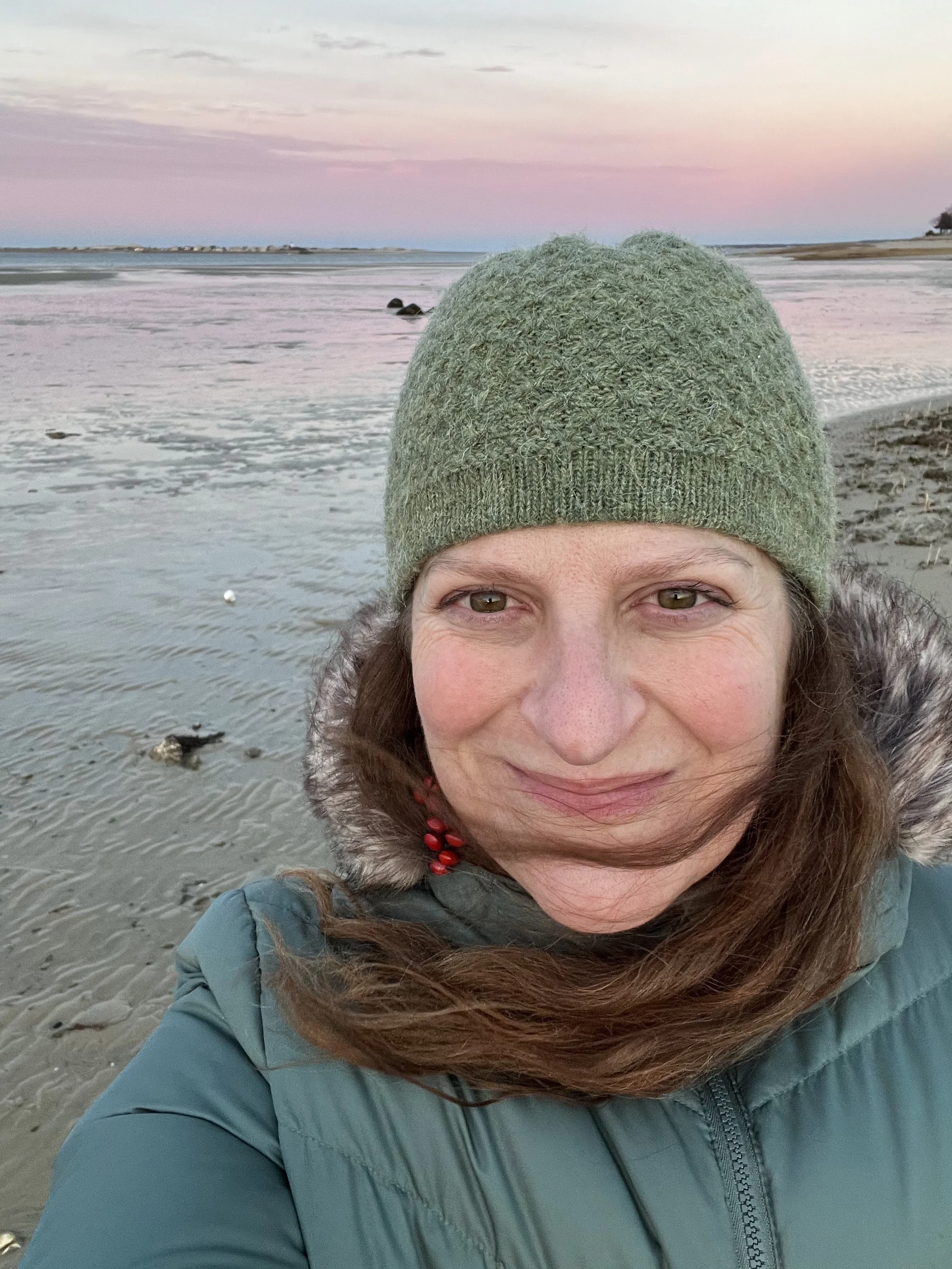 Image of Colleen on a beach