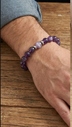 enusia pill holder bracelet amethyst on male arm.png