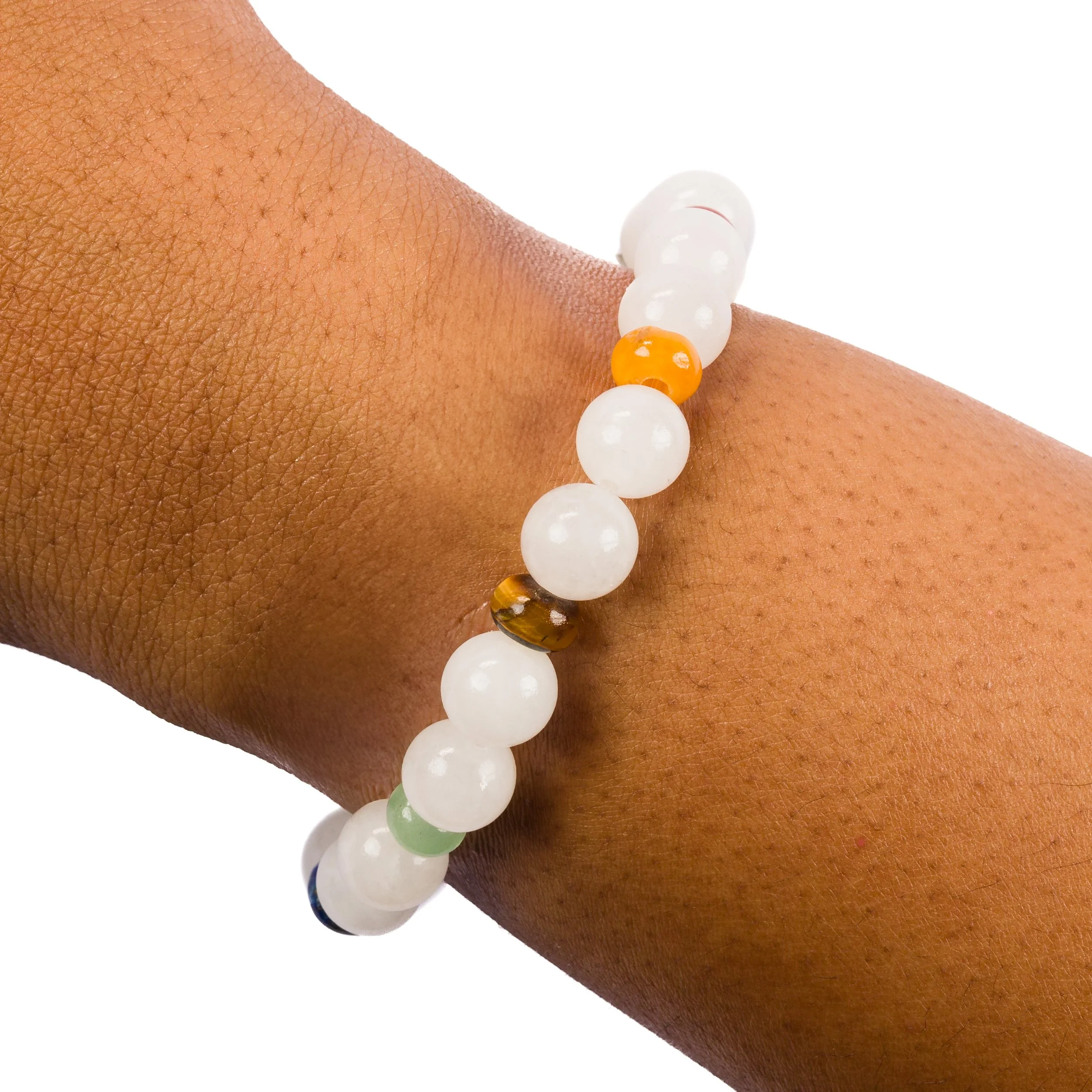 Enusia 7 chakra bracelet with white jade worn on wrist