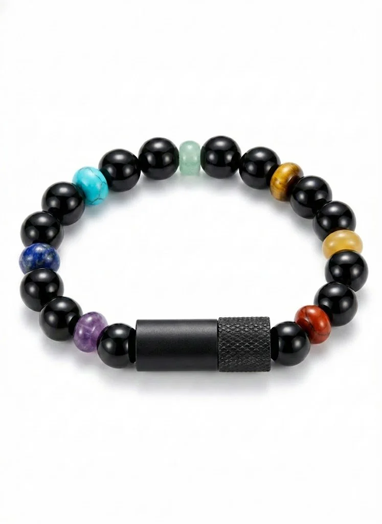 Black onyx 7 chakra pill-holder bracelet by Enusia with matte black vessel