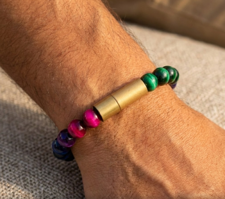 Enusia Mystic Multicolor Tiger Eye Pill holder Bracelet on a wrist