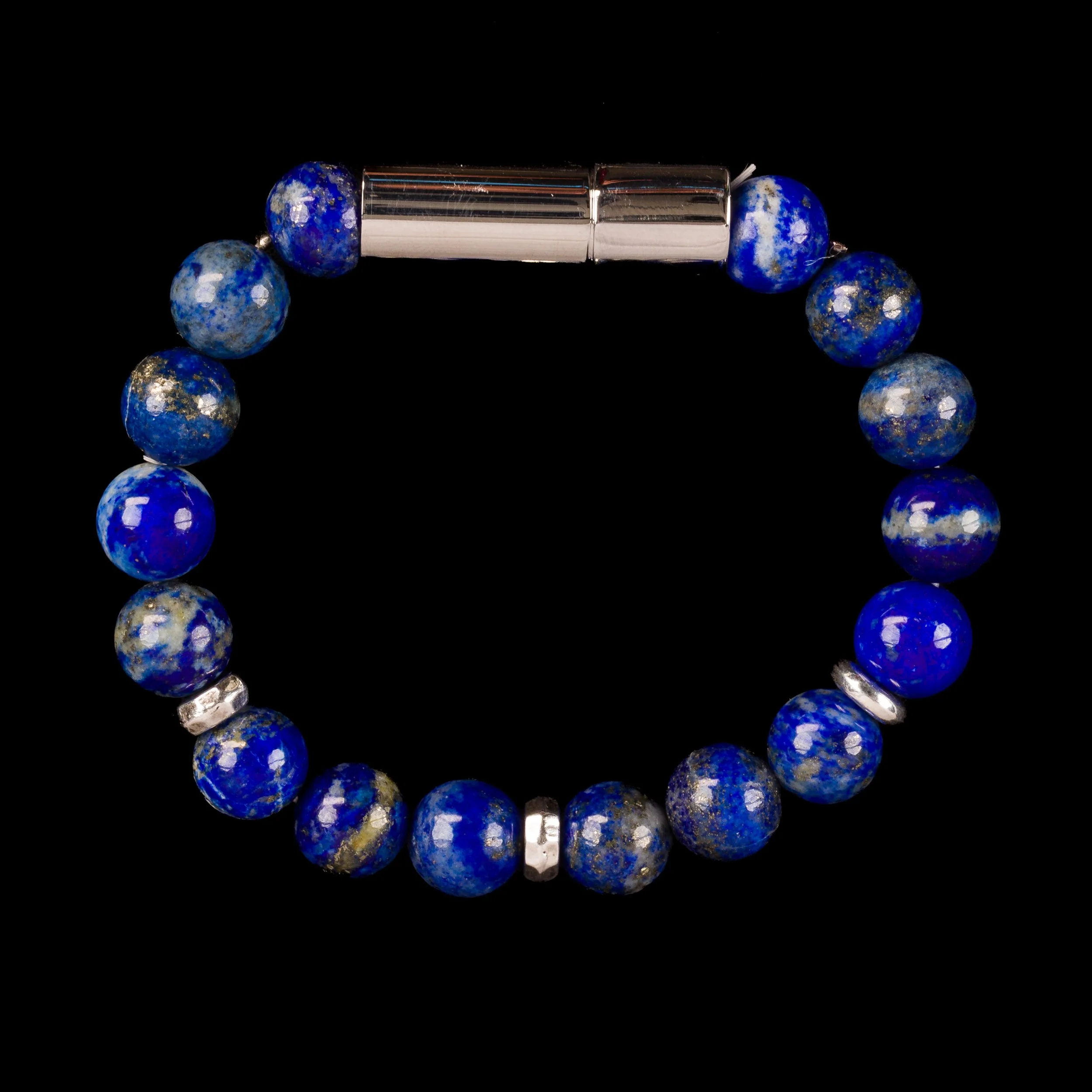 Blue beaded bracelet with silver spacers and a silver magnetic clasp, against a black background.