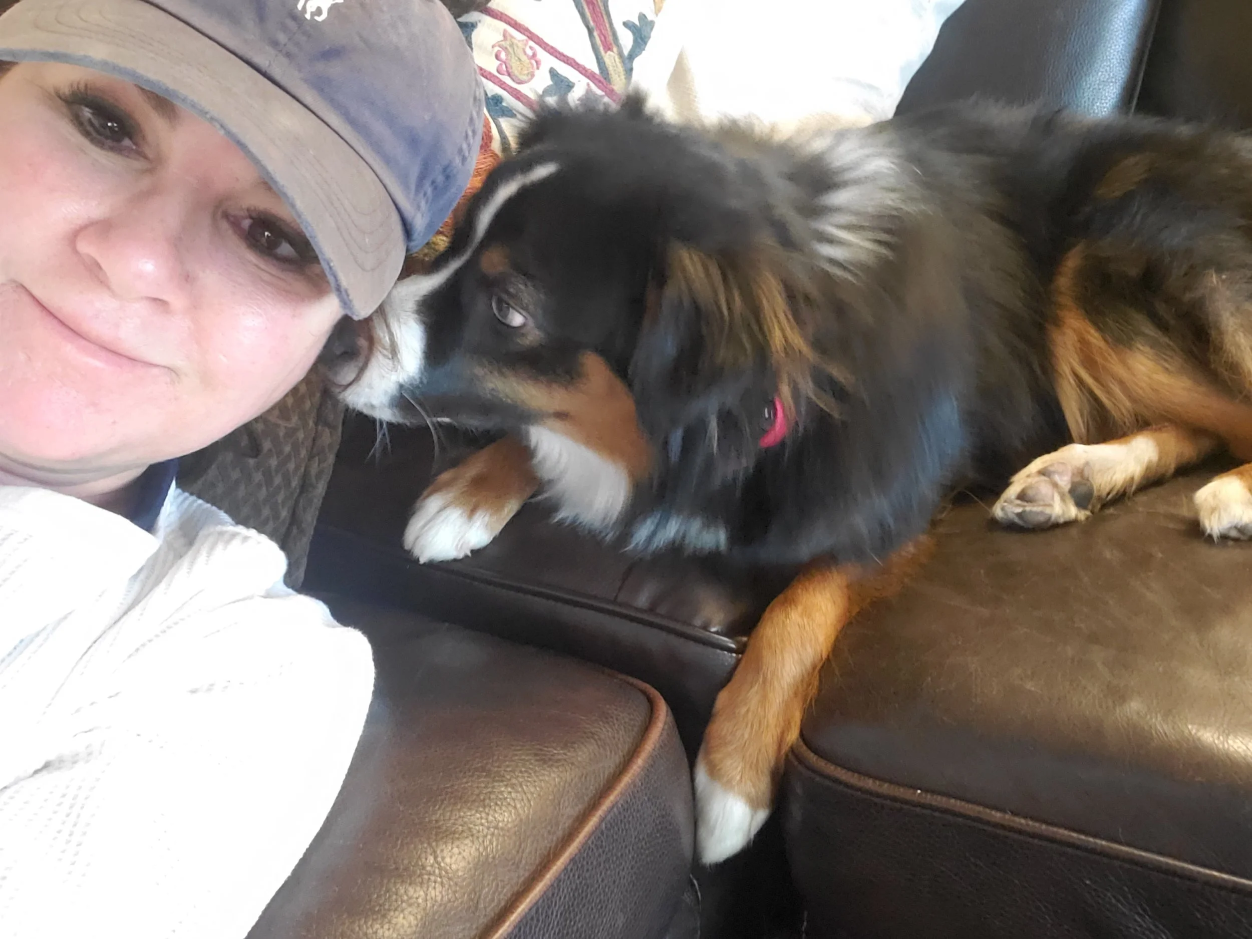 "Enusia founder Diane Friedman with dog Otis, sharing the personal survival story behind the doctor-endorsed medication-carrying bracelet."