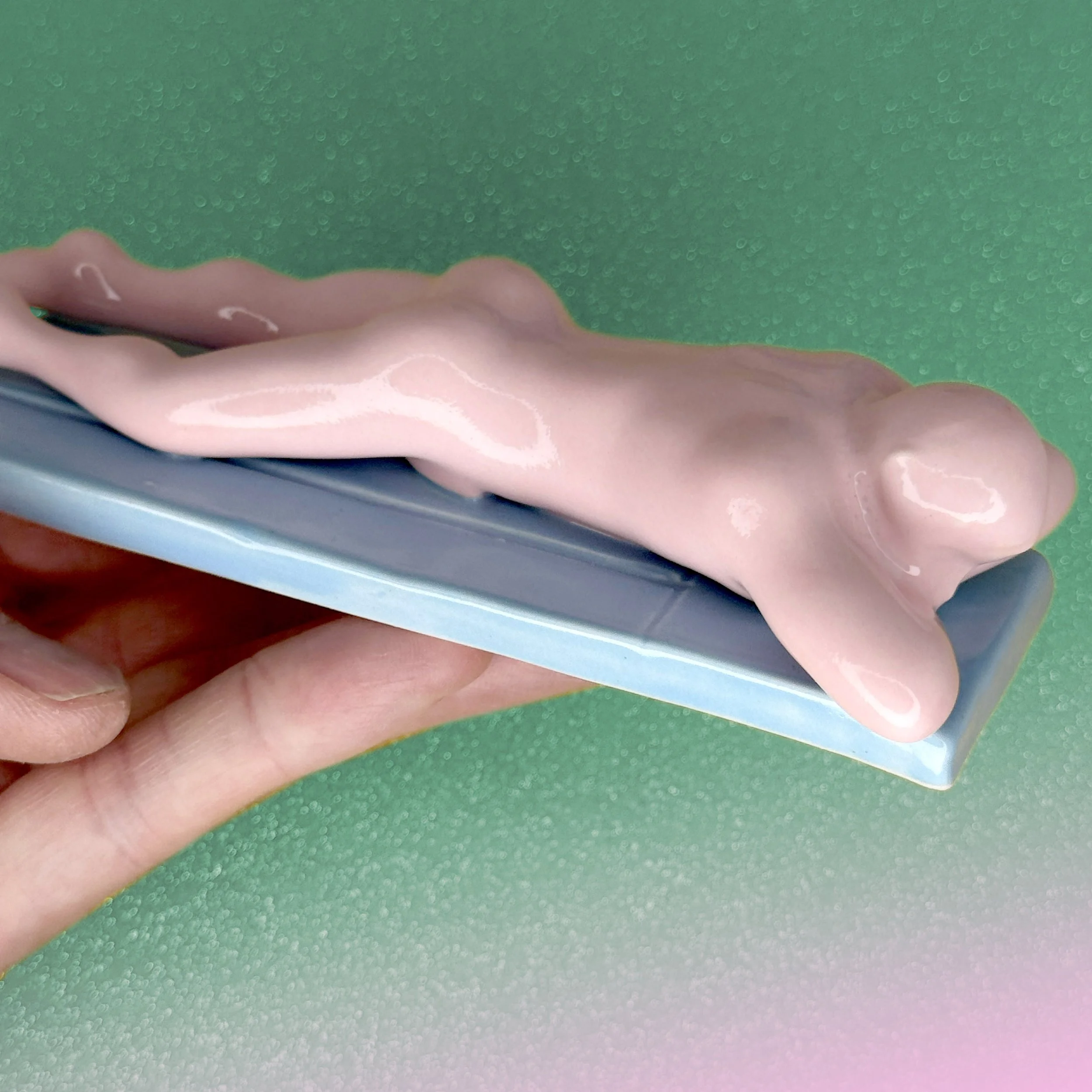 Vacation Buddies Lying On Front in Hand - Pink On Blue copy_.jpg