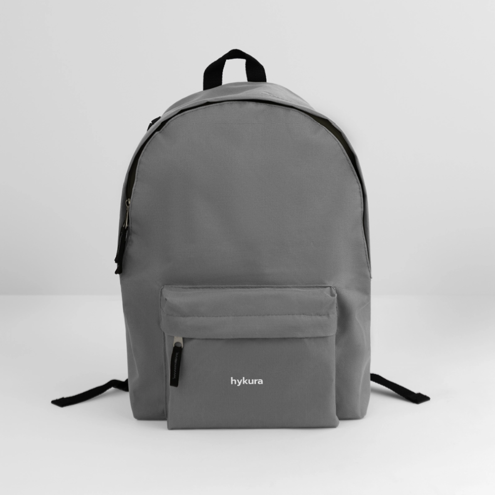 The grey Venture Pack by Hykura is designed for everyday use, with spacious pockets, double zippers, and a headphone port to keep you connected.