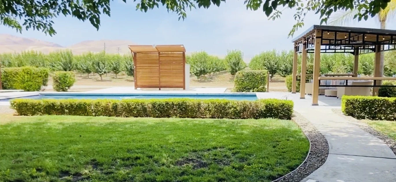 cherry-blossom-villa-pool-area-pavilion-orchard-backdrop.jpg