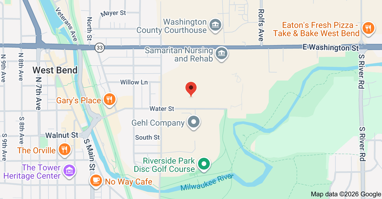Map of West Bend, Wisconsin showing streets, landmarks, restaurants, parks, and rivers.