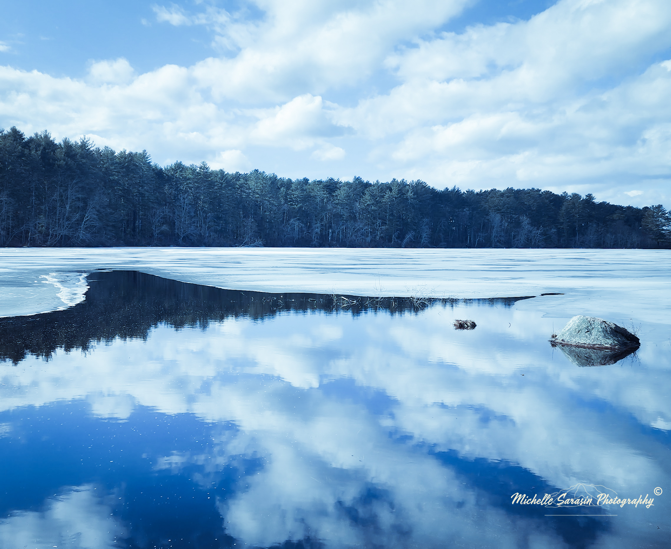 Frozen Lake Upon A Winter Landscape