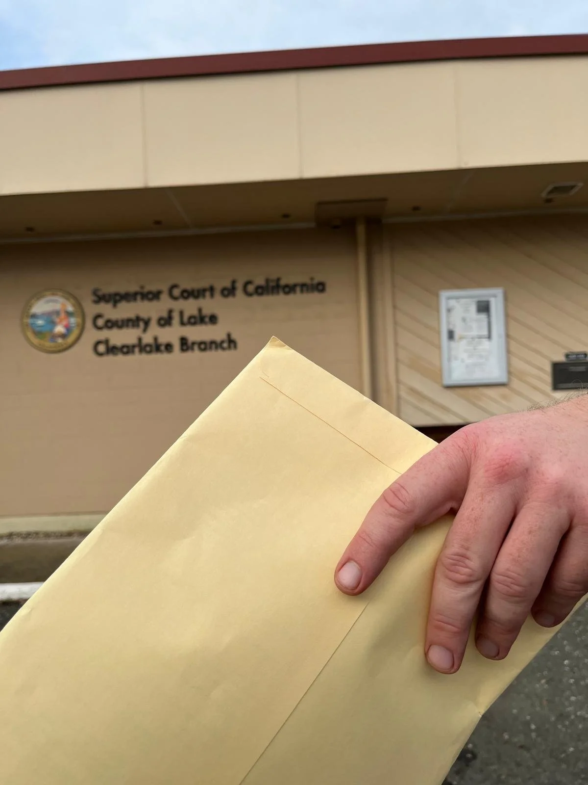 Eviction and unlawful detainer documents being served outside the Clearlake branch of the Lake County Superior Court by Redwood Lakes Legal Documents