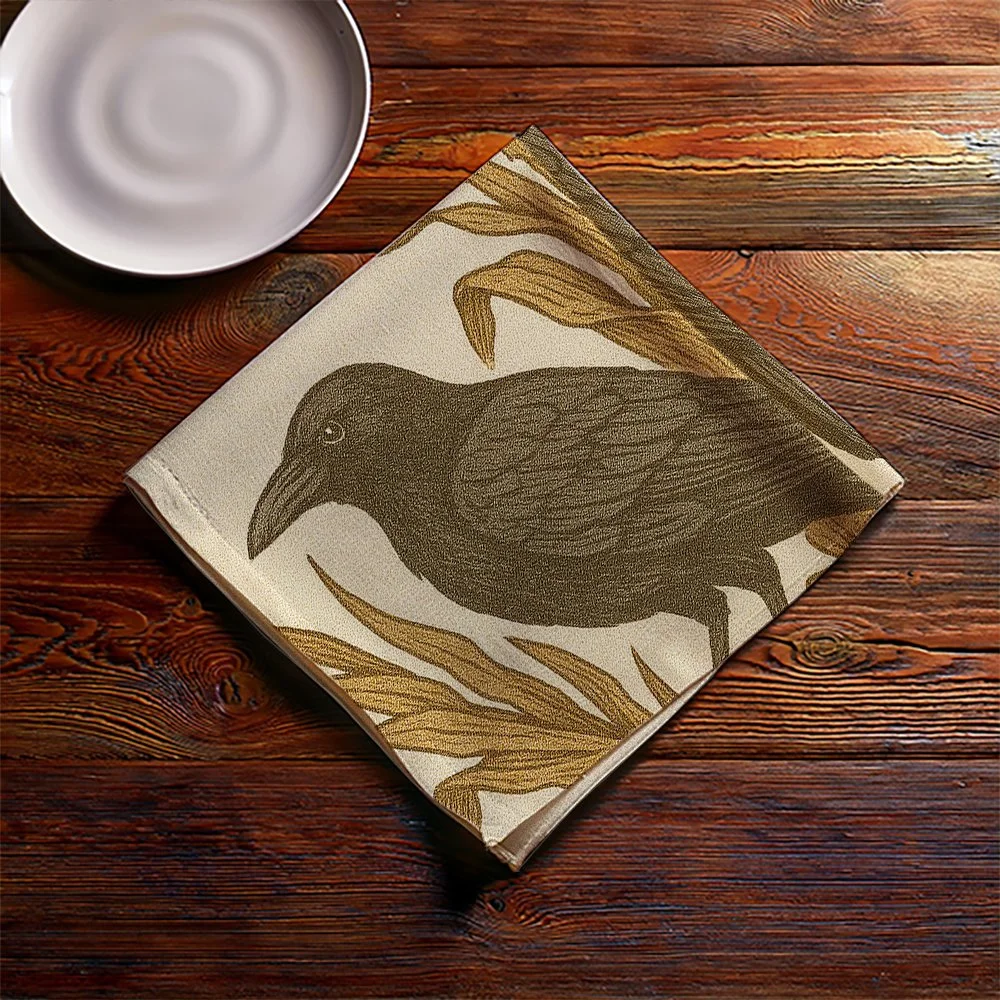 crow with corn napkin folded on table with saucer