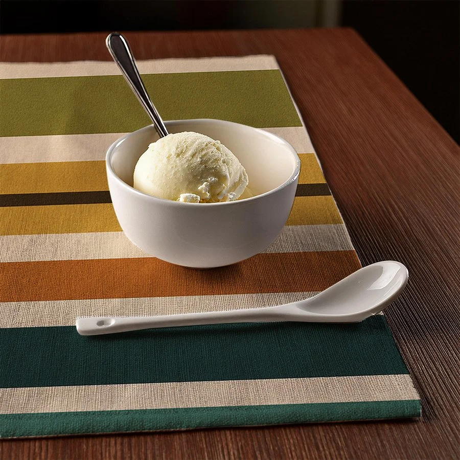 striped placemat with icecream and spoon