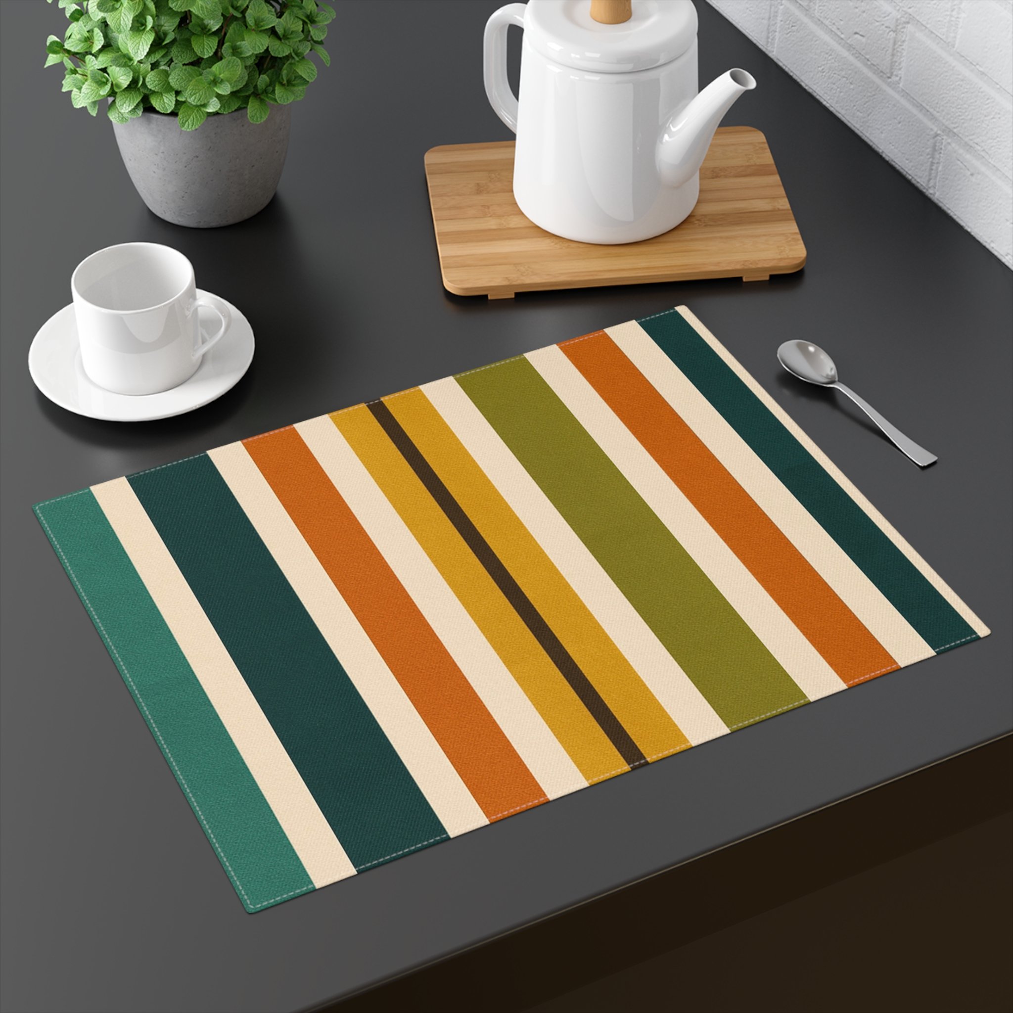 striped placemat on table with coffee pot and cup