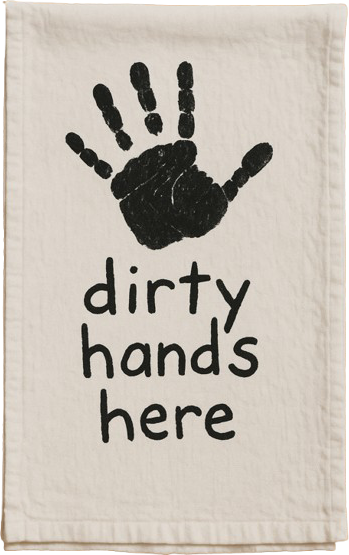 A child's handprint on a flour sack towel